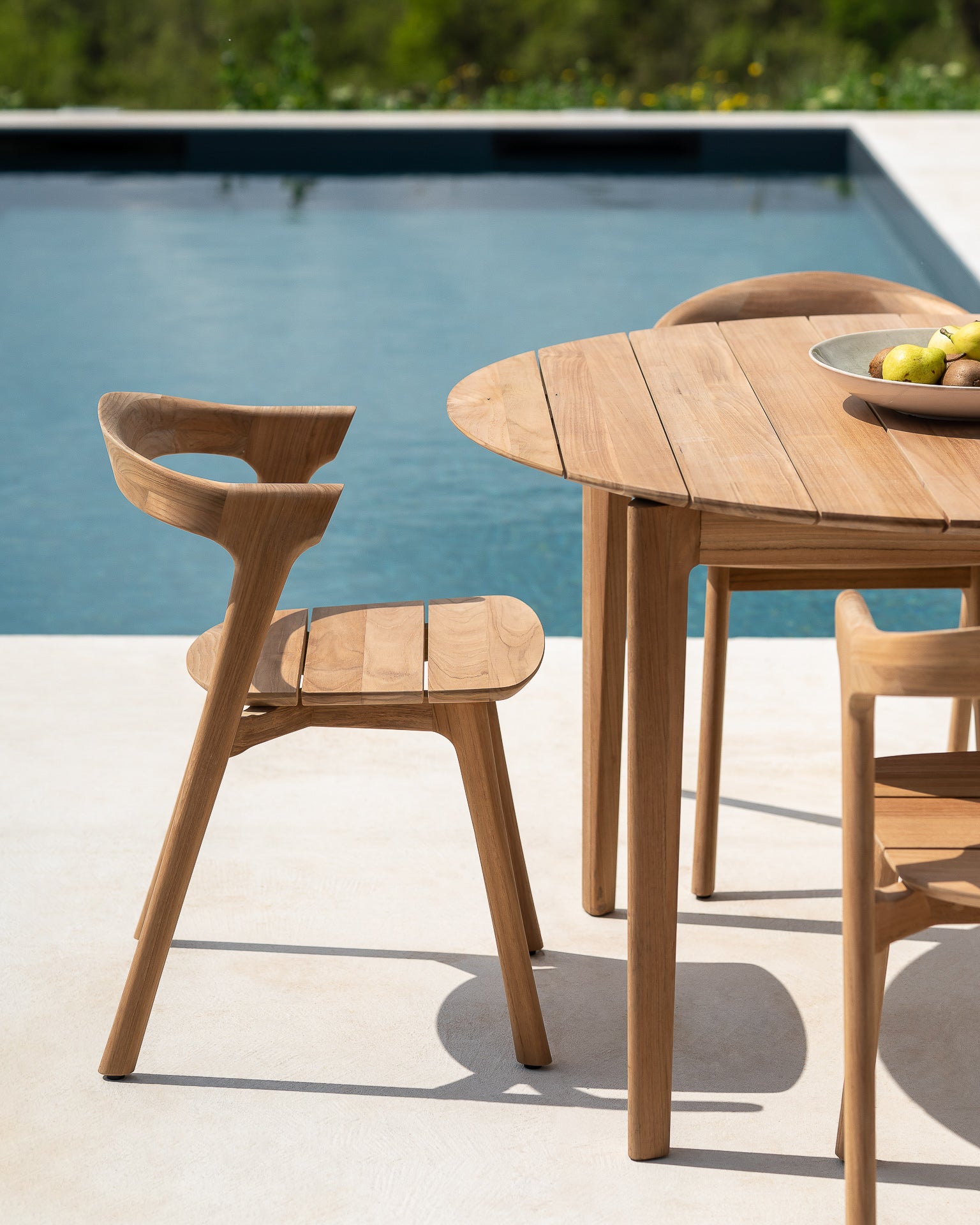 Bok-outdoor-chair-teak-Bok-outdoor-table-round-Goode-Studio
