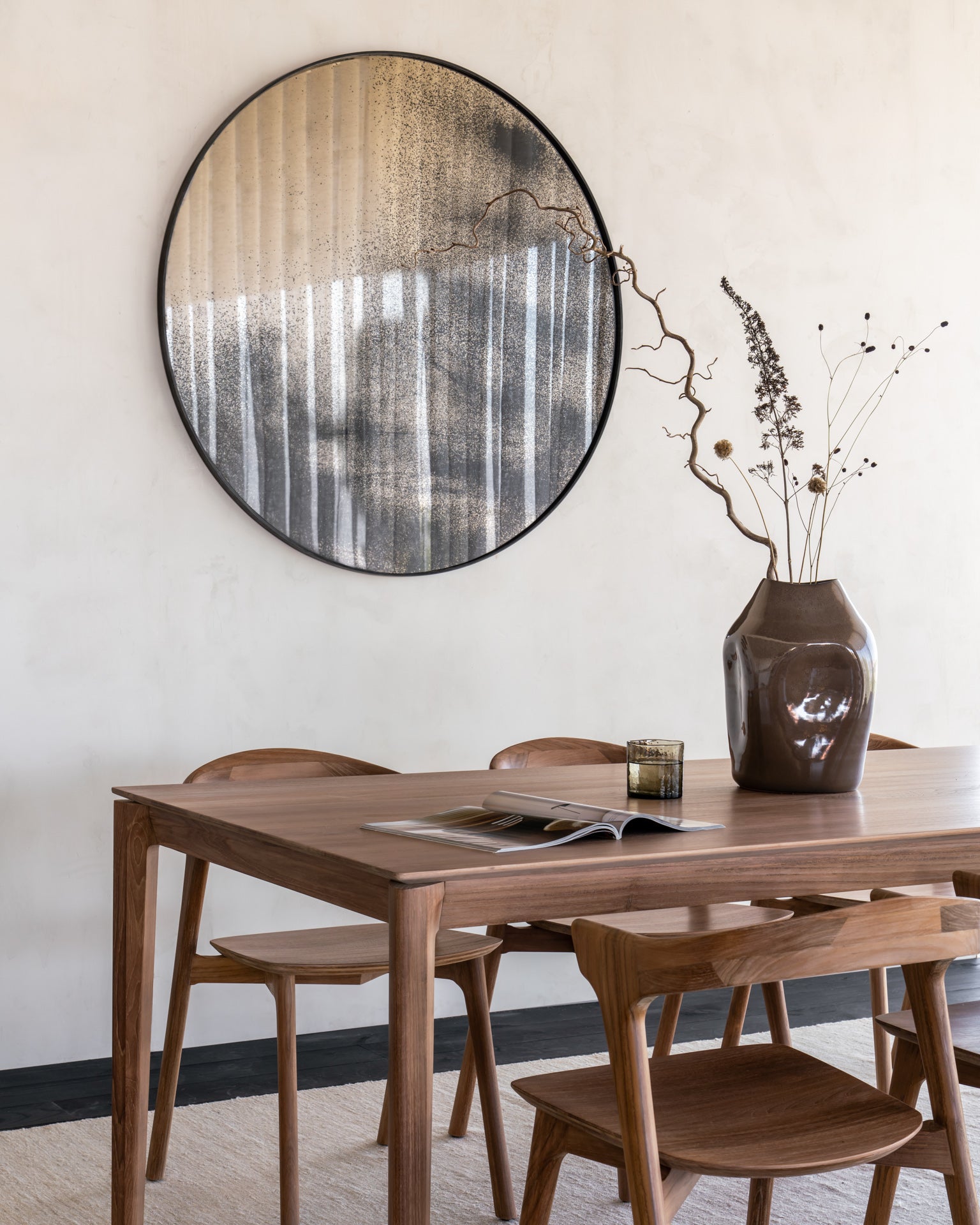 Teak-Bok-dining-table-teak-Bok-chair-Bronze-wall-mirror-121cm-Sand-Nomad-kilim-rug-Goode-Studio