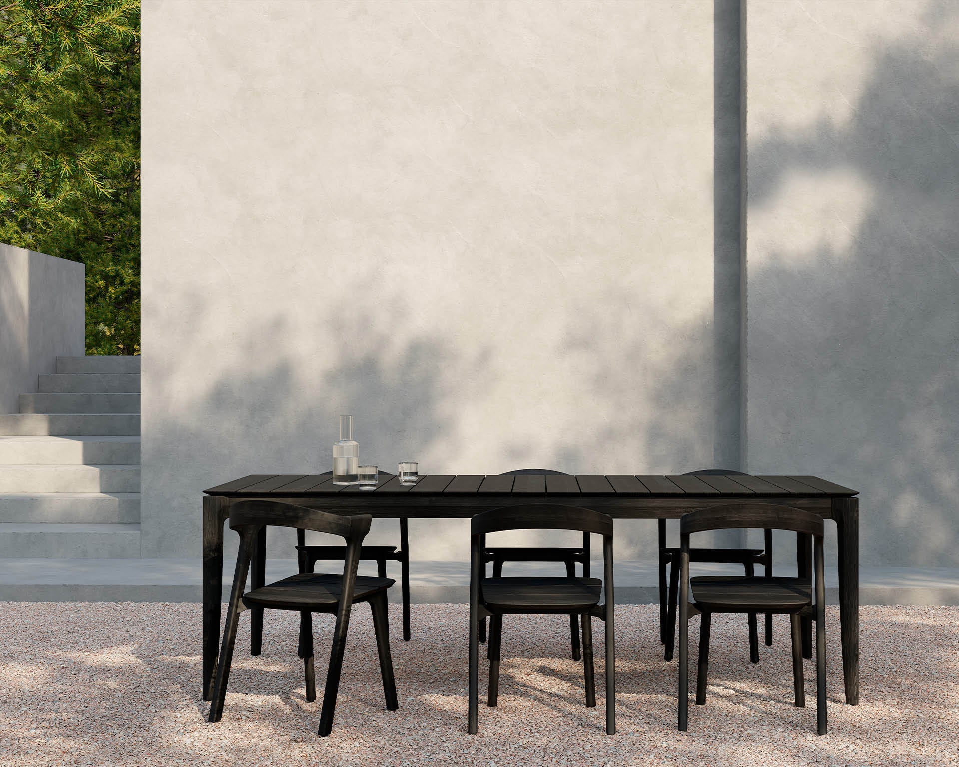 Bok Outdoor Dining Table, Teak Black - Goode Studio