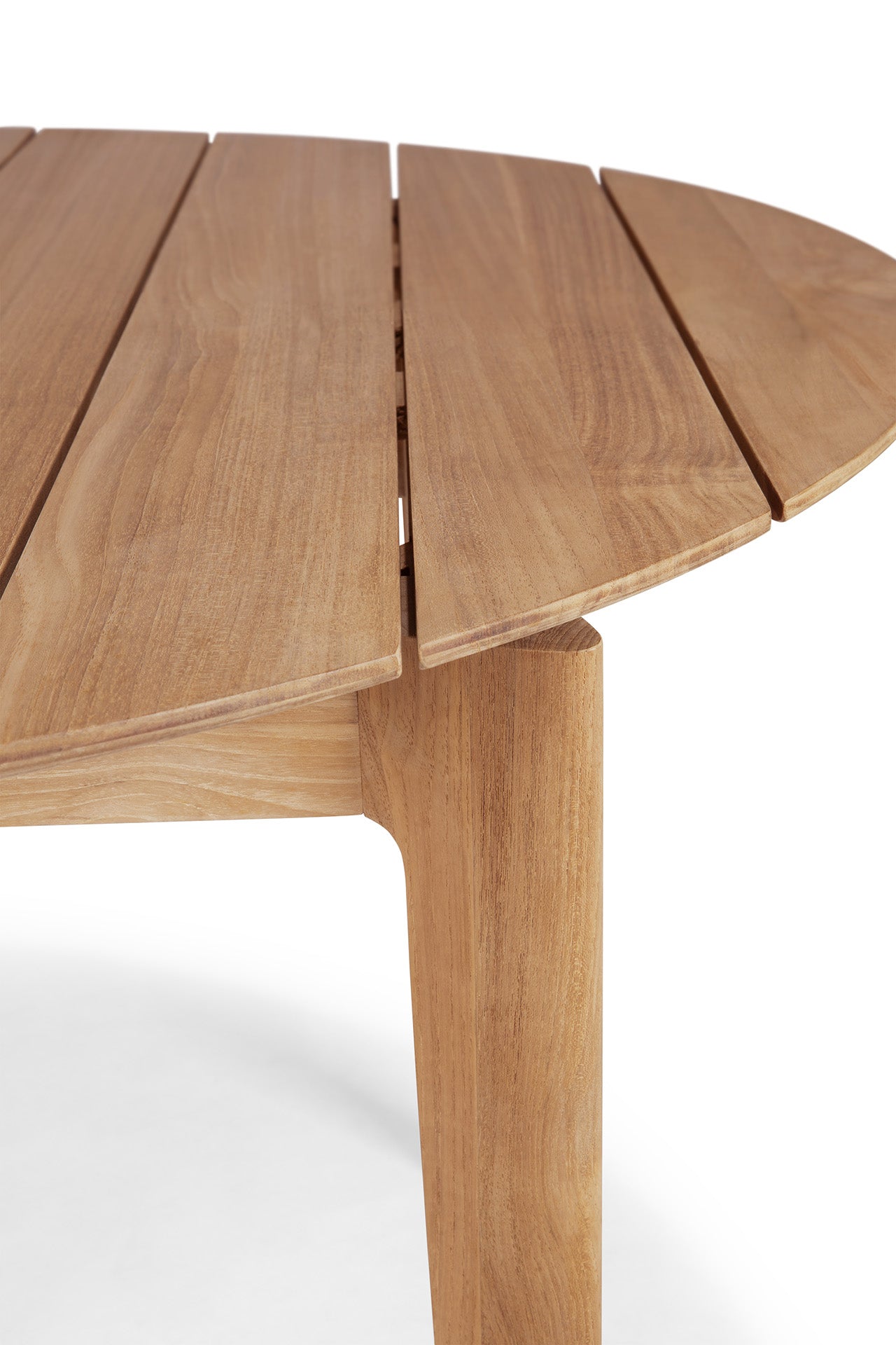 Bok-outdoor-dining-table-teak-round-cut-Goode-Studio