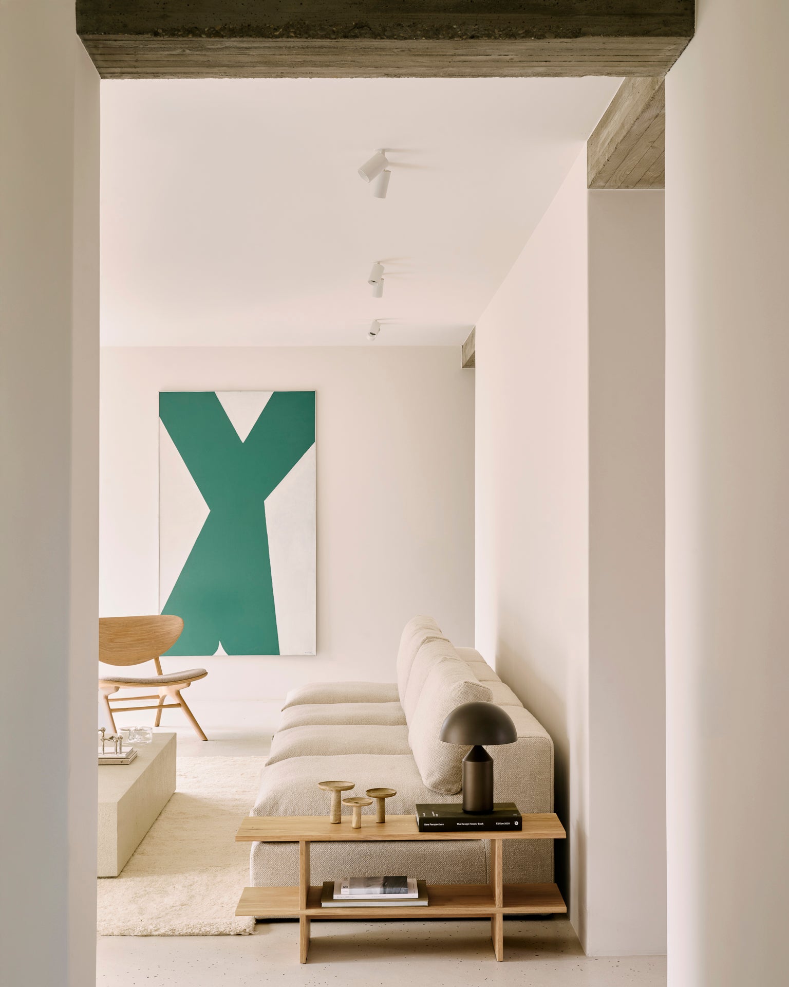 Mellow-modular-sofa-ivory-Kabuki-side-table-Eye-lounge-chair-off-white-Elements-floor-shelf-Dunes-rug-Sand-Goode-Studio