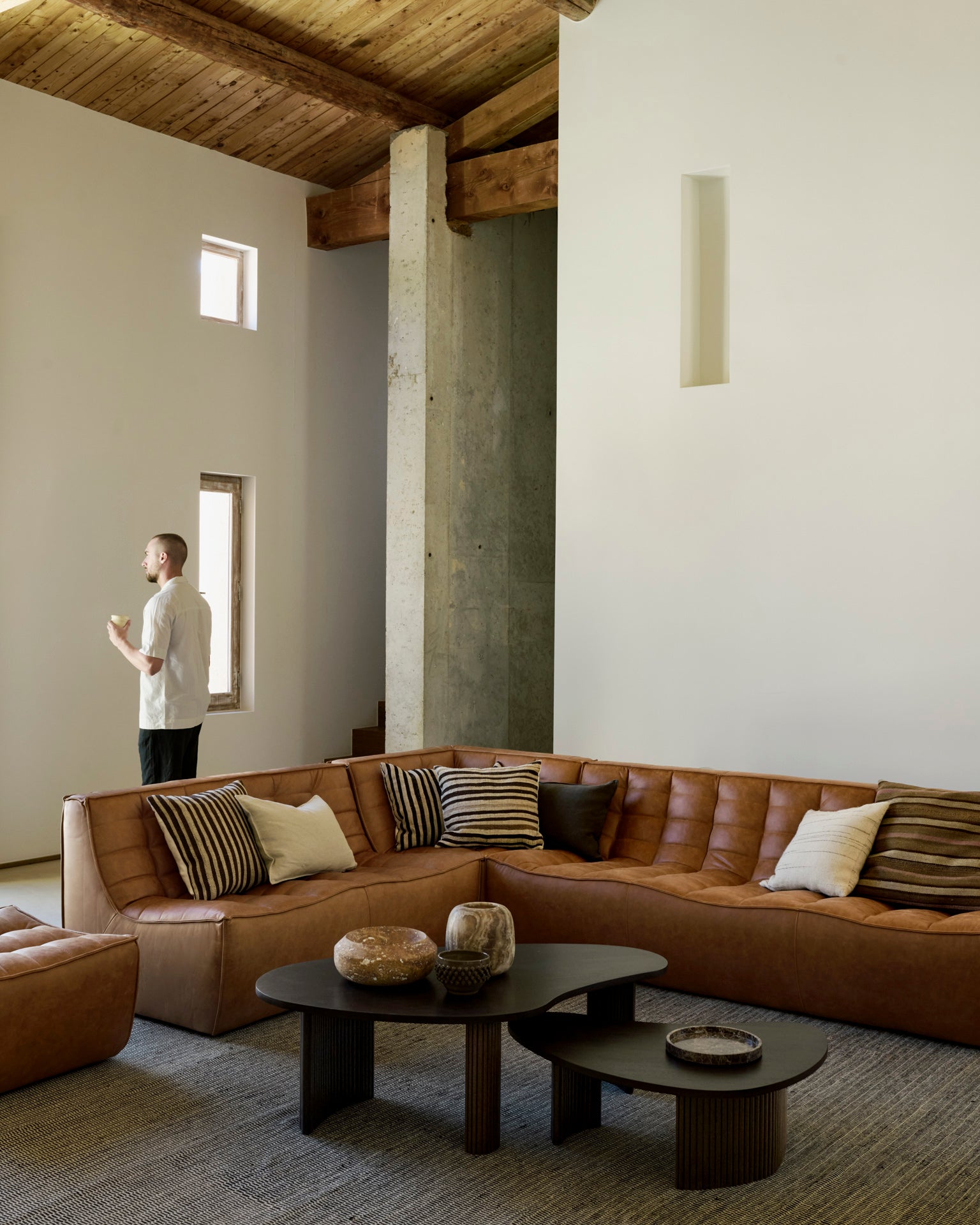 N701-footstool-2-seater-corner-3-seater-Boomerang-coffee-table-man-Goode-Studio