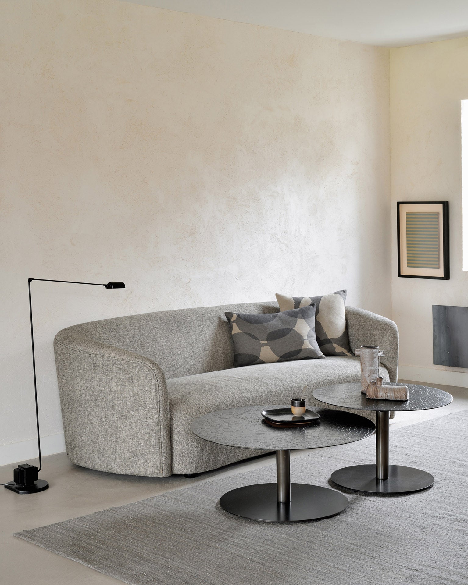 Ellipse-sofa-ash-Grey-Nomad-kilim-rug-Layered-Dots-cushion-Connected-Dots-cushion-Sphere-coffee-table-umber-Goode-Studio