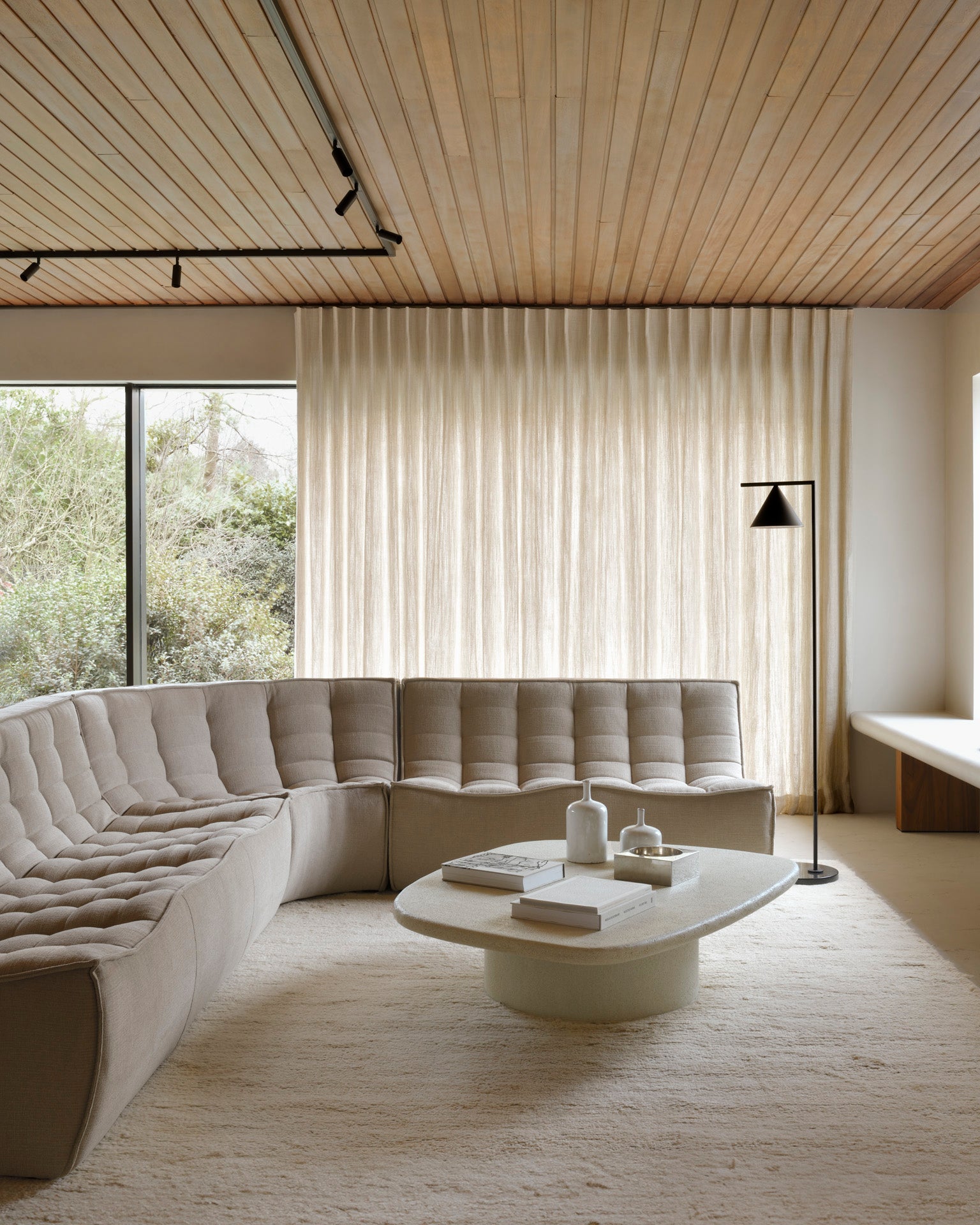 N701-sofa-2-seater-N701-90-round-corner-Ecru-Eco-fabric-N701-sofa-3-seater-Elements-coffee-table-off-white-pebble-shape-Dunes-rug-sand-Goode-Studio