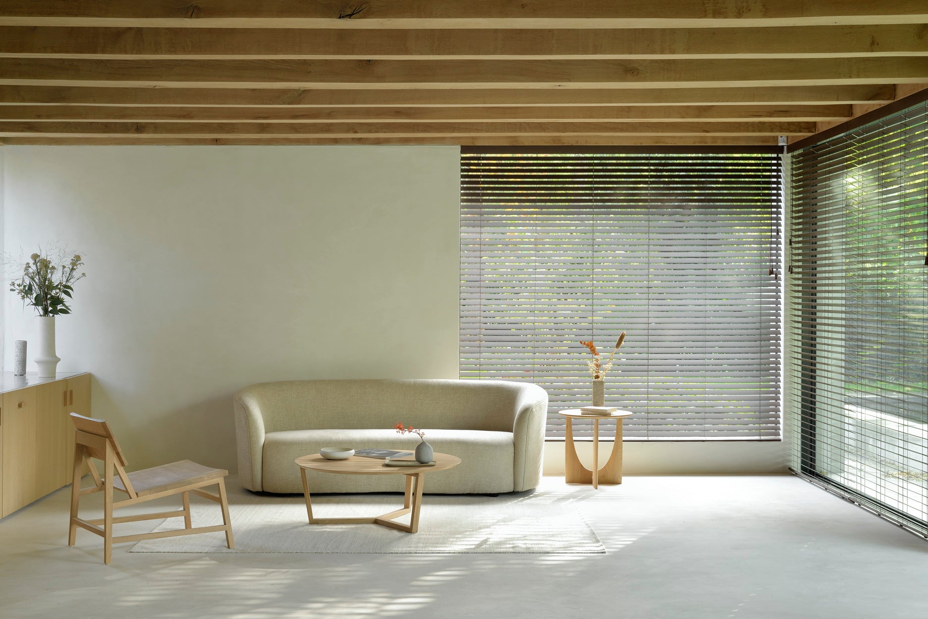 Sand-Nomad-kilim-rug-Ellipse-sofa-3-seater-oatmeal-side-table-coffee-table-lounge-chair-Goode-Studio