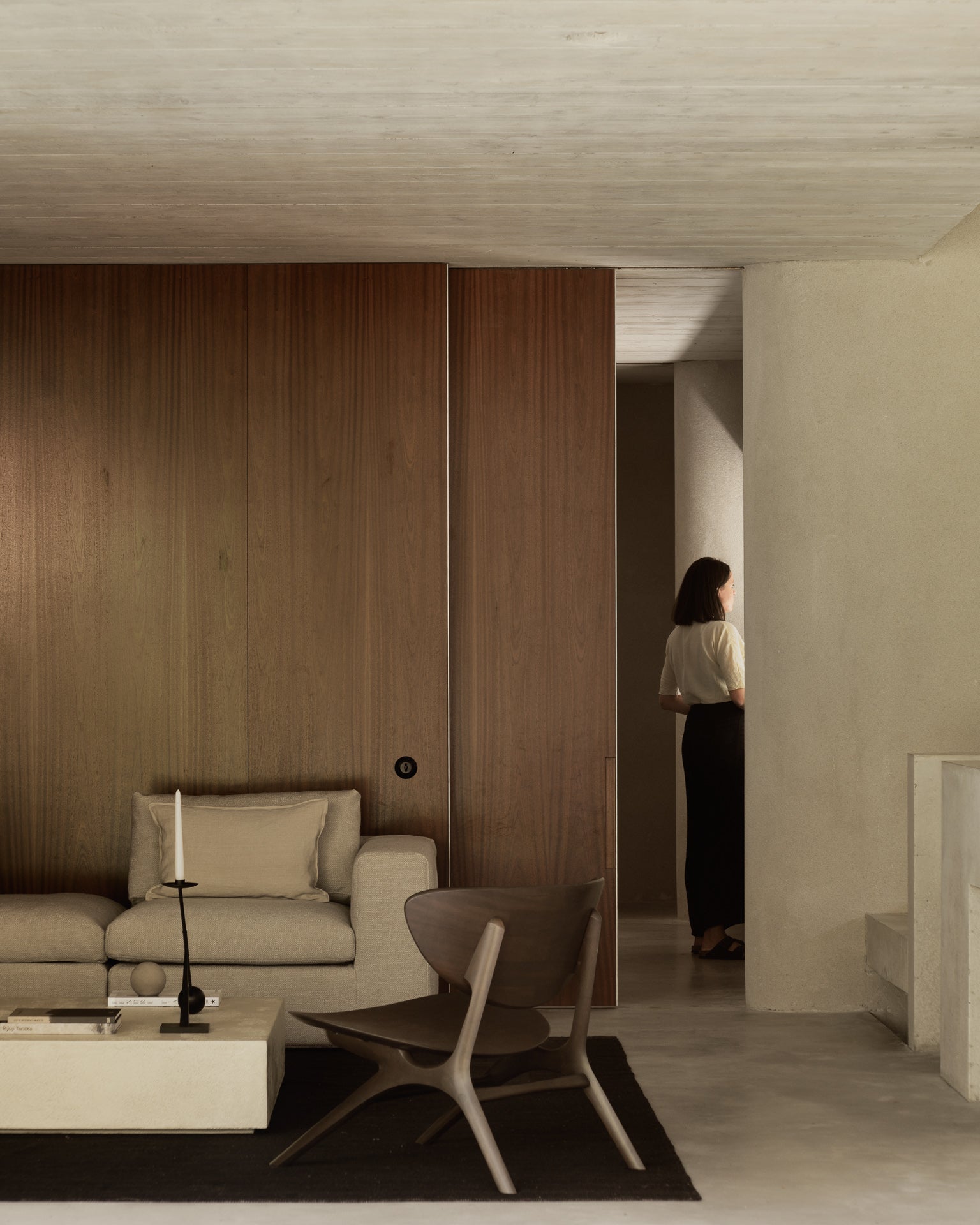 Eye-lounge-chair-mahogany-dark-brown-mellow-sofa-end-seater-L-arm-off-white-eco-fabric-elements-coffee-table-microcement-rectangular-person-Goode-Studio