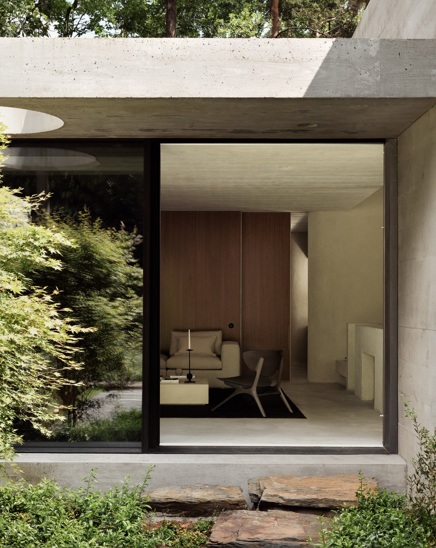 Eye-lounge-chair-mahogany-dark-brown-mellow-sofa-end-seater-L-arm-off-white-eco-fabric-elements-coffee-table-microcement-rectangular-wide-Goode-Studio