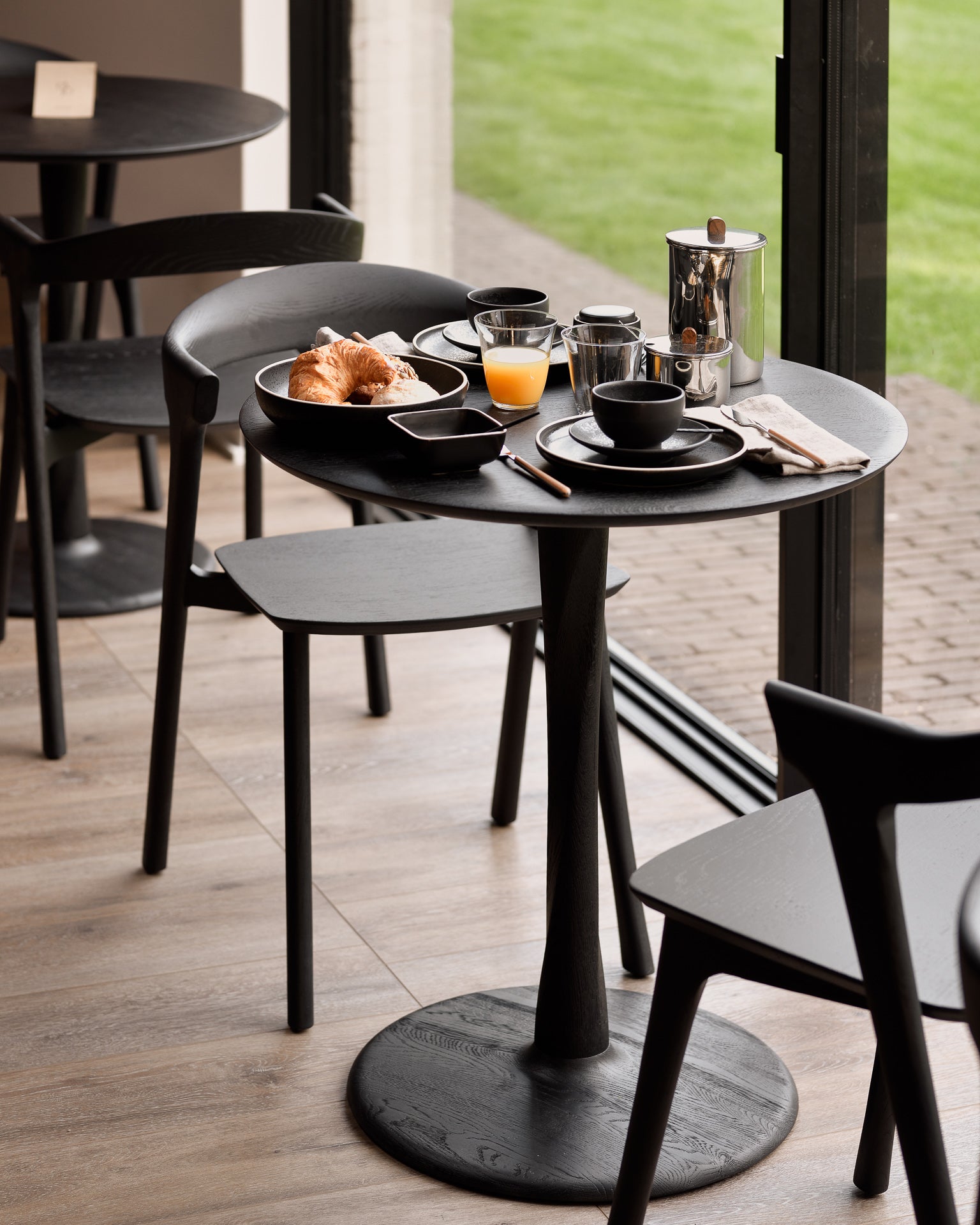Torsion Dining Table Round, Oak Black - Goode Studio