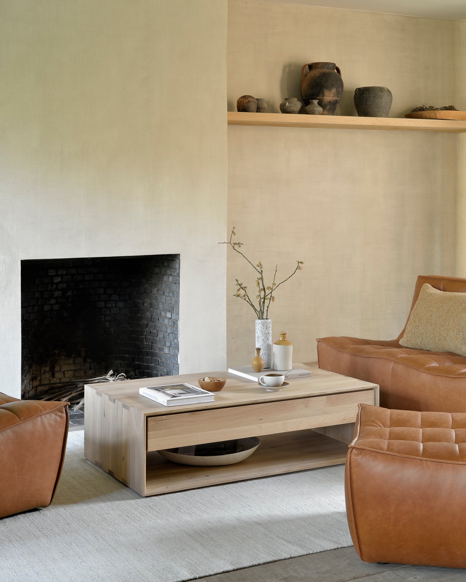 Oak-Nordic-coffee-table-N701-sofa-2-seater-old-saddle-N701-sofa-footstool-old-saddle-Camel-Nomad-throw-Sand-Nomad-kilim-rug-Goode-Studio
