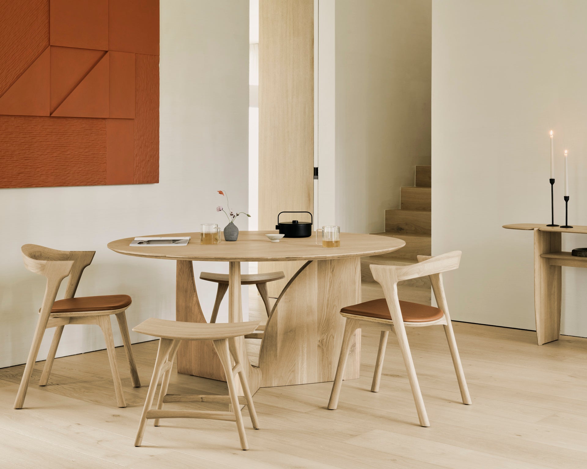 Geometric-dining-table-oak-round-Bok-chair-cognac-leather-Osso-stool-PI-console-Goode-Studio