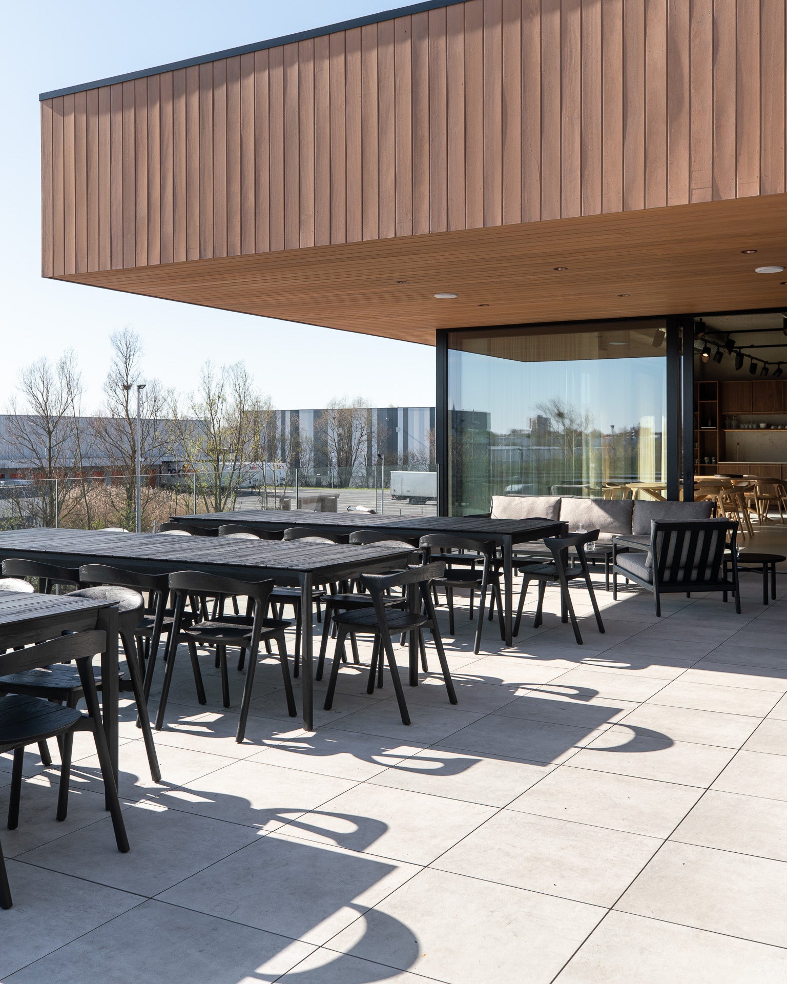 Bok Outdoor Dining Table, Teak Black - Goode Studio