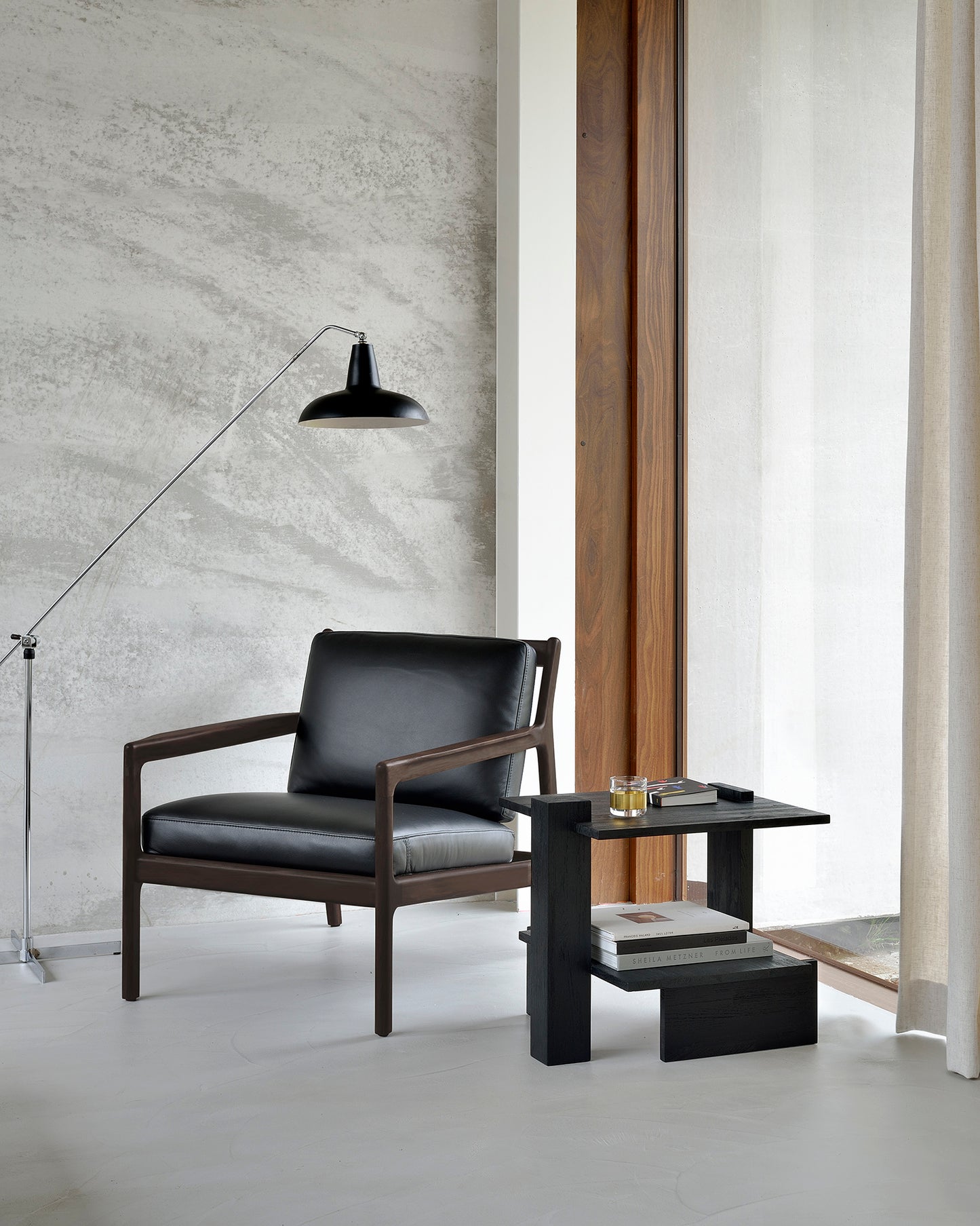 Abstract-black-side-table-Jack-lounge-chair-Goode-Studio