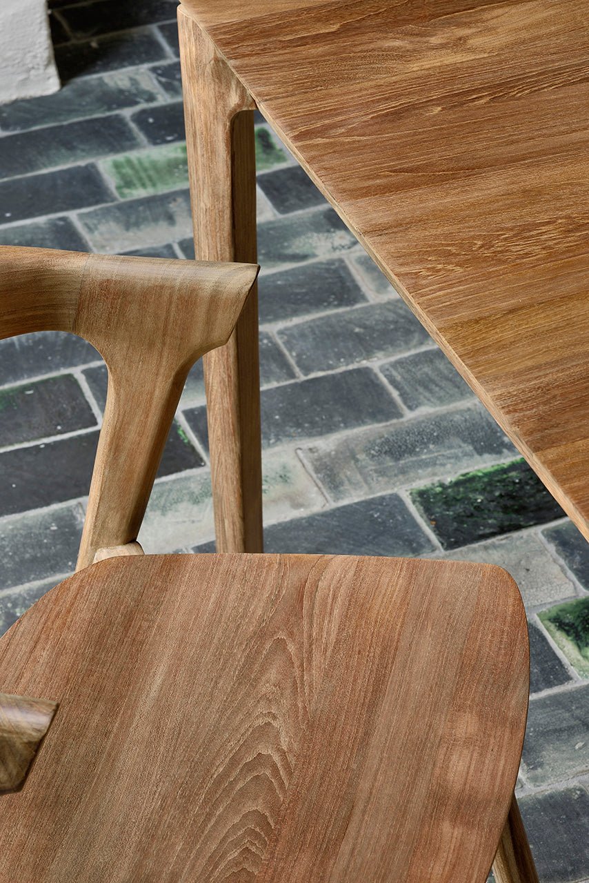 Solid teak dining table for residential dining room
