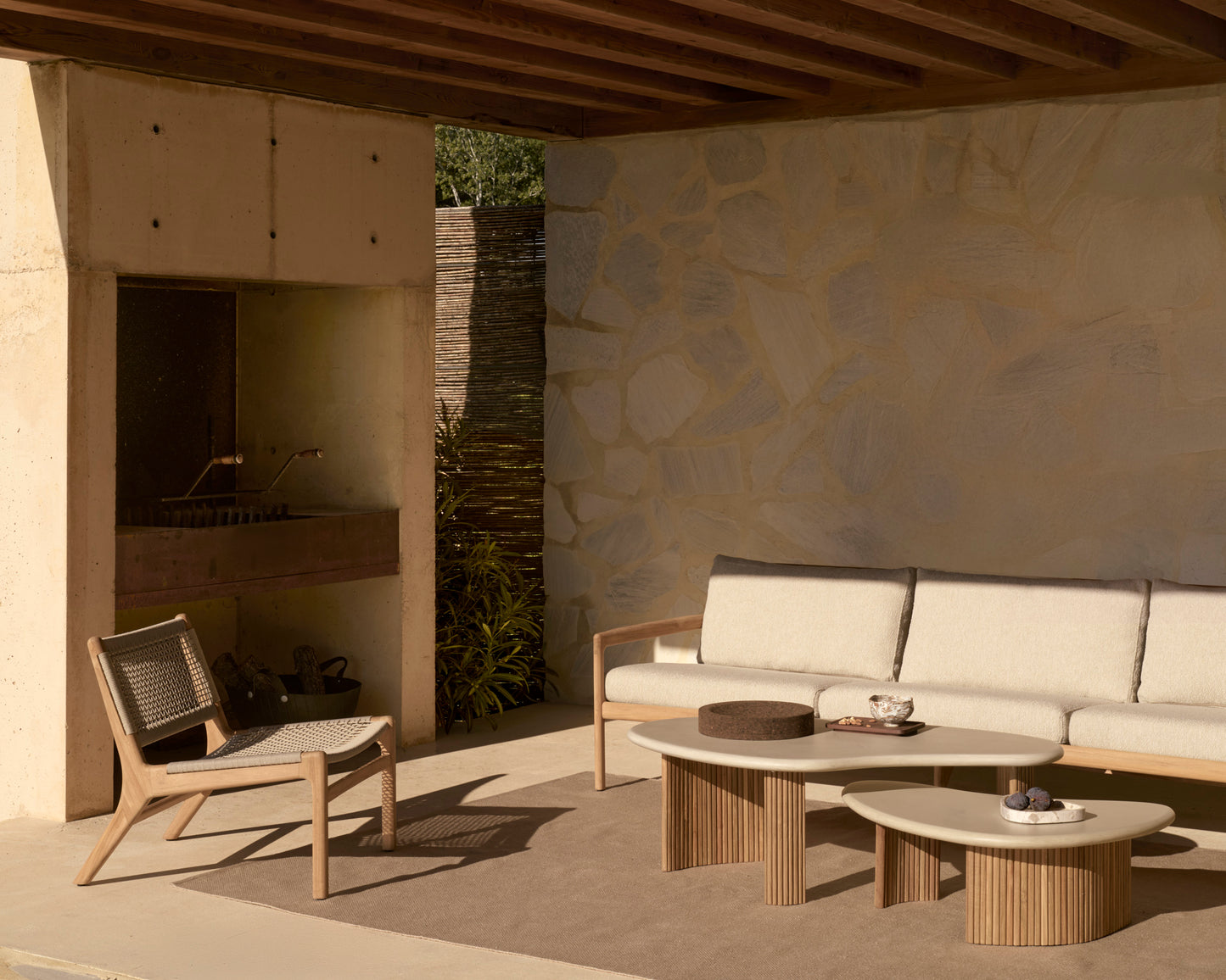 Jack-Woven-outdoor-lounge-chair-seater-Jack-outdoor-sofa-natural-Boomerang-outdoor-coffee-table-Nomad-rug-Goode-Studio