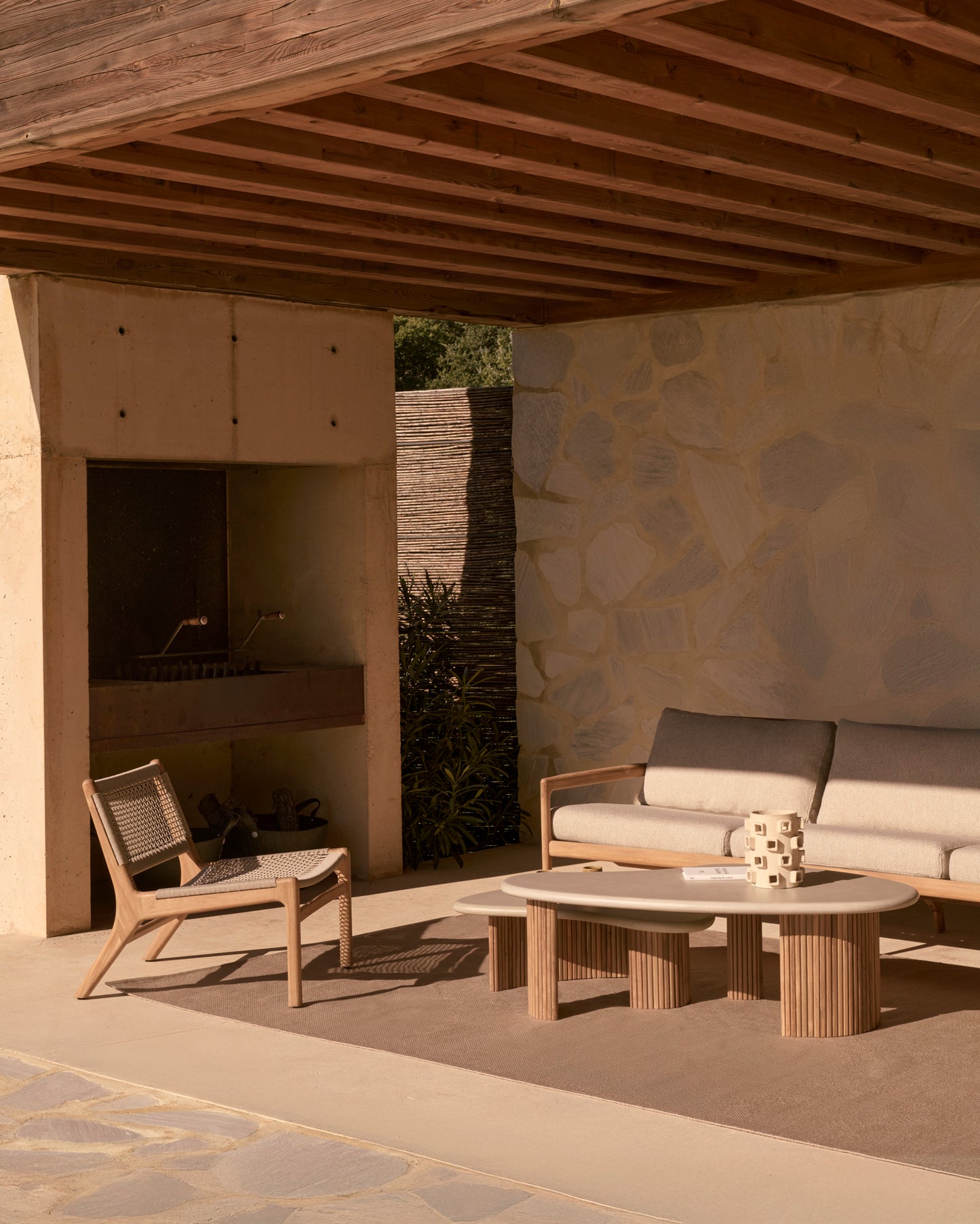 Jack-Woven-outdoor-lounge-chair-seater-Jack-outdoor-sofa-natural-Boomerang-outdoor-coffee-table-Nomad-rug-Goode-Studio