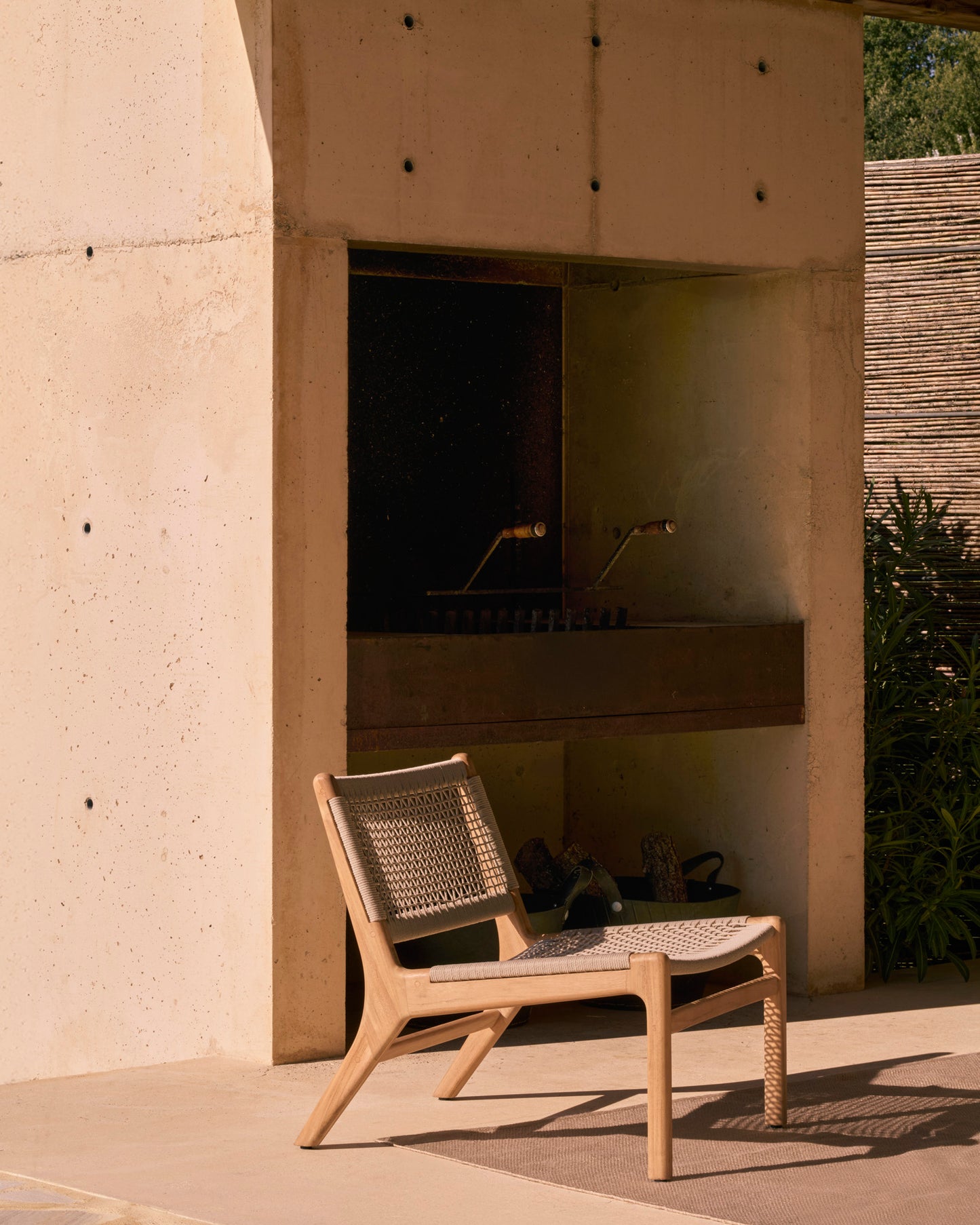 Jack-Woven-outdoor-lounge-chair-Nomad-rug-Goode-Studio