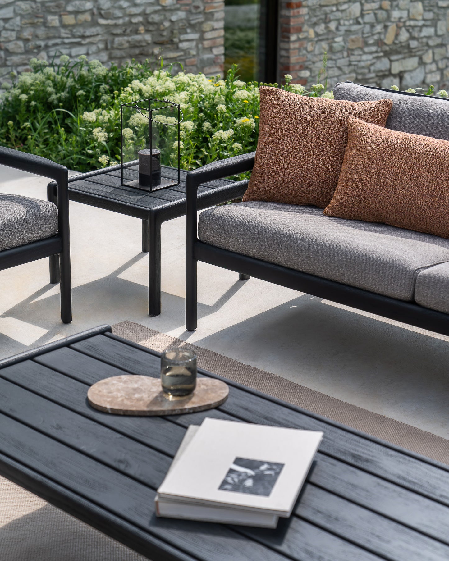 Jack-sofa-mocha-Nomad-cushion-Nomad-rug-Jack-side-table-coffee-table-Goode-Studio