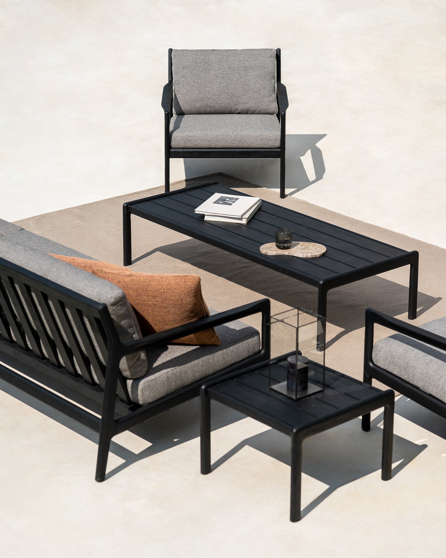 Jack-sofa-mocha-Nomad-cushion-Nomad-rug-Jack-side-table-coffee-table-Goode-Studio