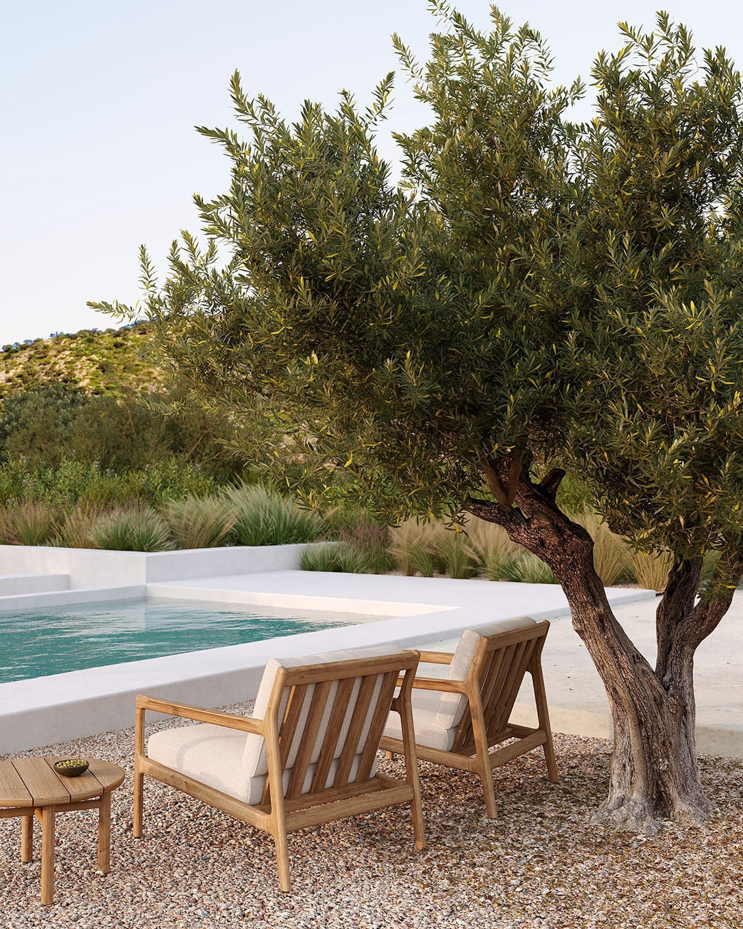 Teak-Jack-outdoor-lounge-chair-off-white-Quatro-side-table-Goode-Studio
