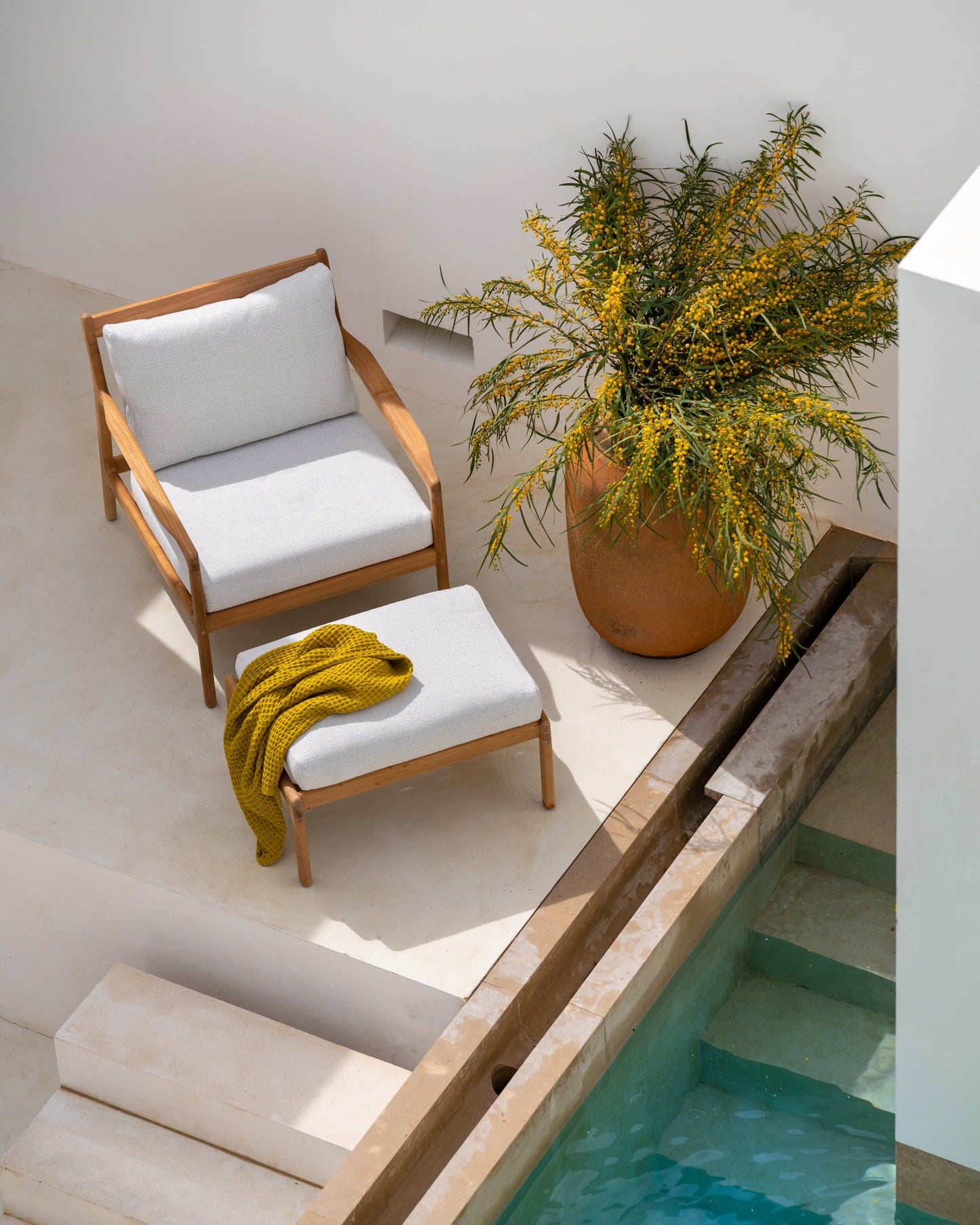 Teak-outdoor-lounge-chair-off-white-Outdoor-footstool-off-white-Goode-Studio
