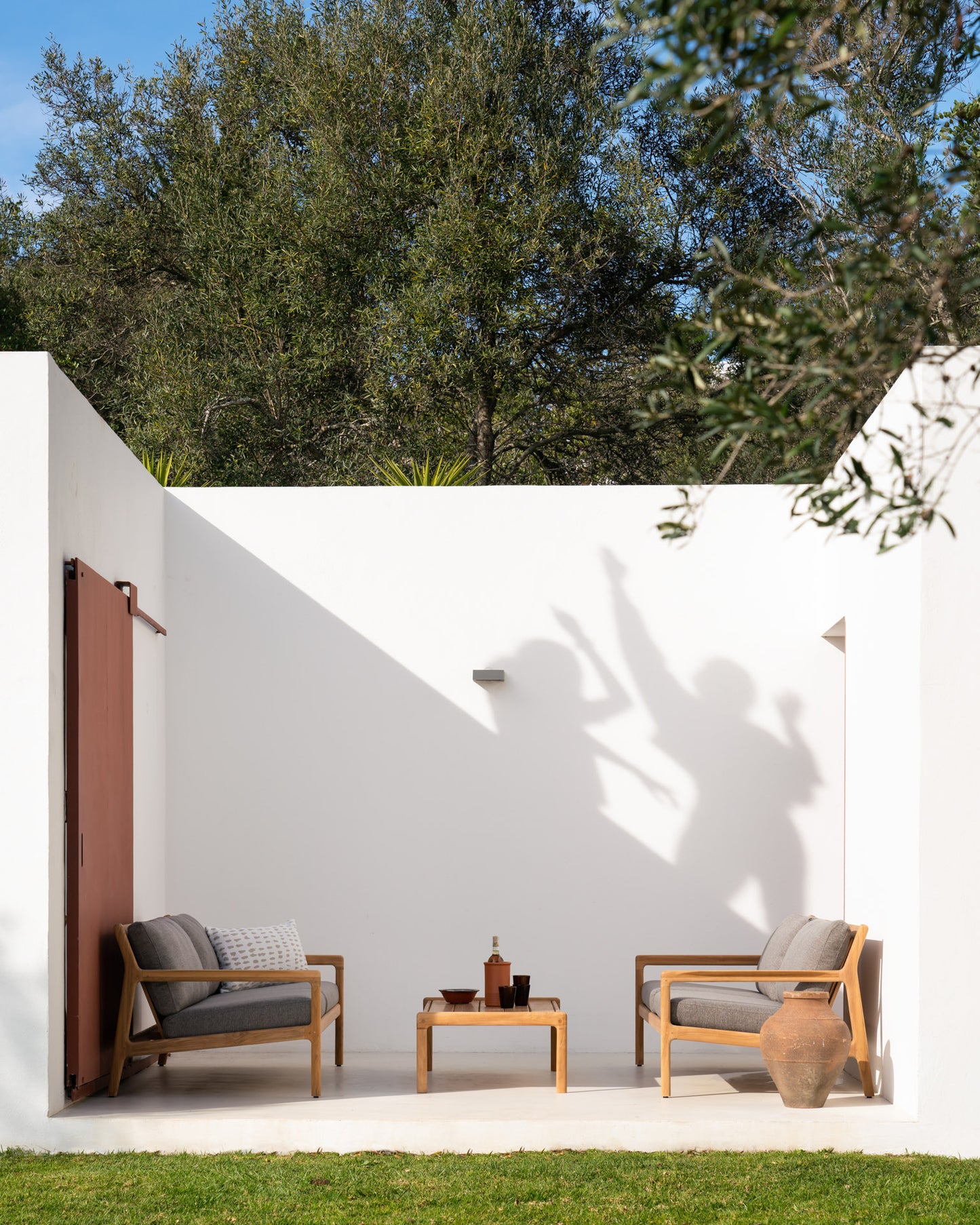 Jack-outdoor-sofa-mocha-Jack-coffee-table-white-dots-lumbar-cushion-Goode-Studio