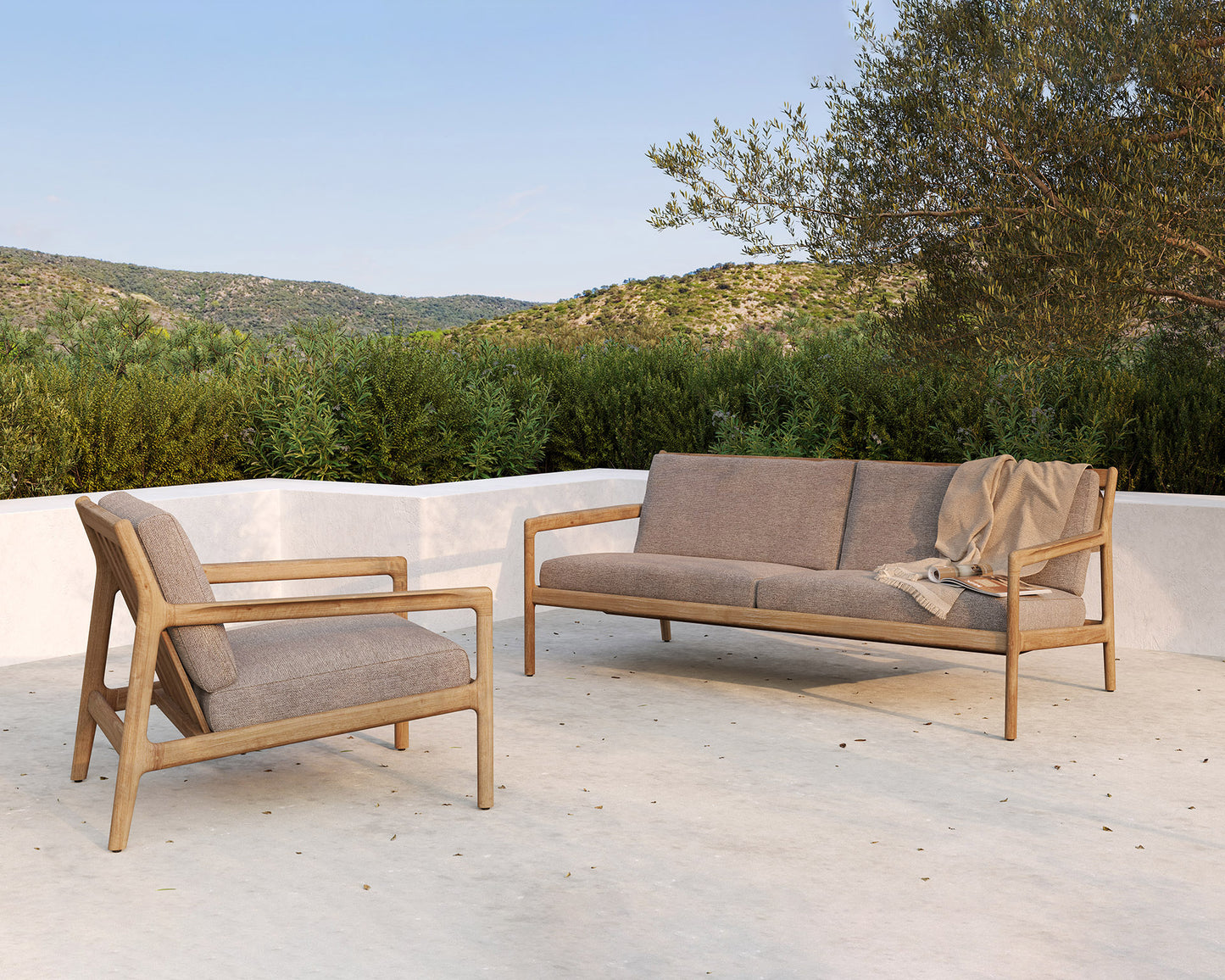 Teak-Jack-outdoor-sofa-mocha-Teak-Jack-outdoor-sofa-mocha-Oat-Nomad-throw-Goode-Studio