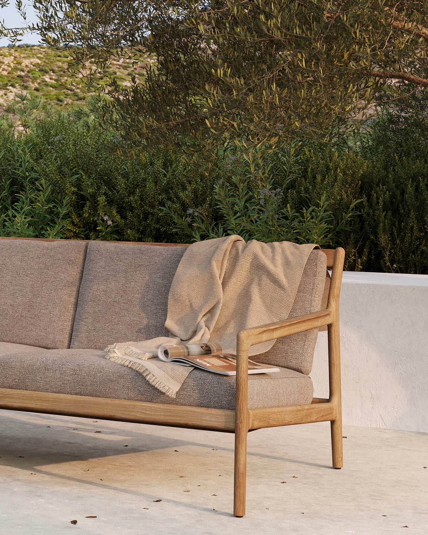 Teak-Jack-outdoor-sofa-mocha-Teak-Jack-outdoor-sofa-mocha-Oat-Nomad-throw-Goode-Studio