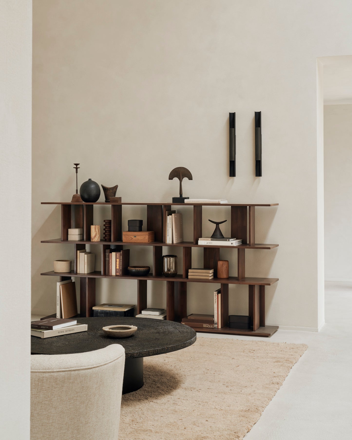 Irregular-rack-teak-brown-Ellipse-sofa-oatmeal-Slice-coffee-table-Dunes-rug-cumin-Goode-Studio