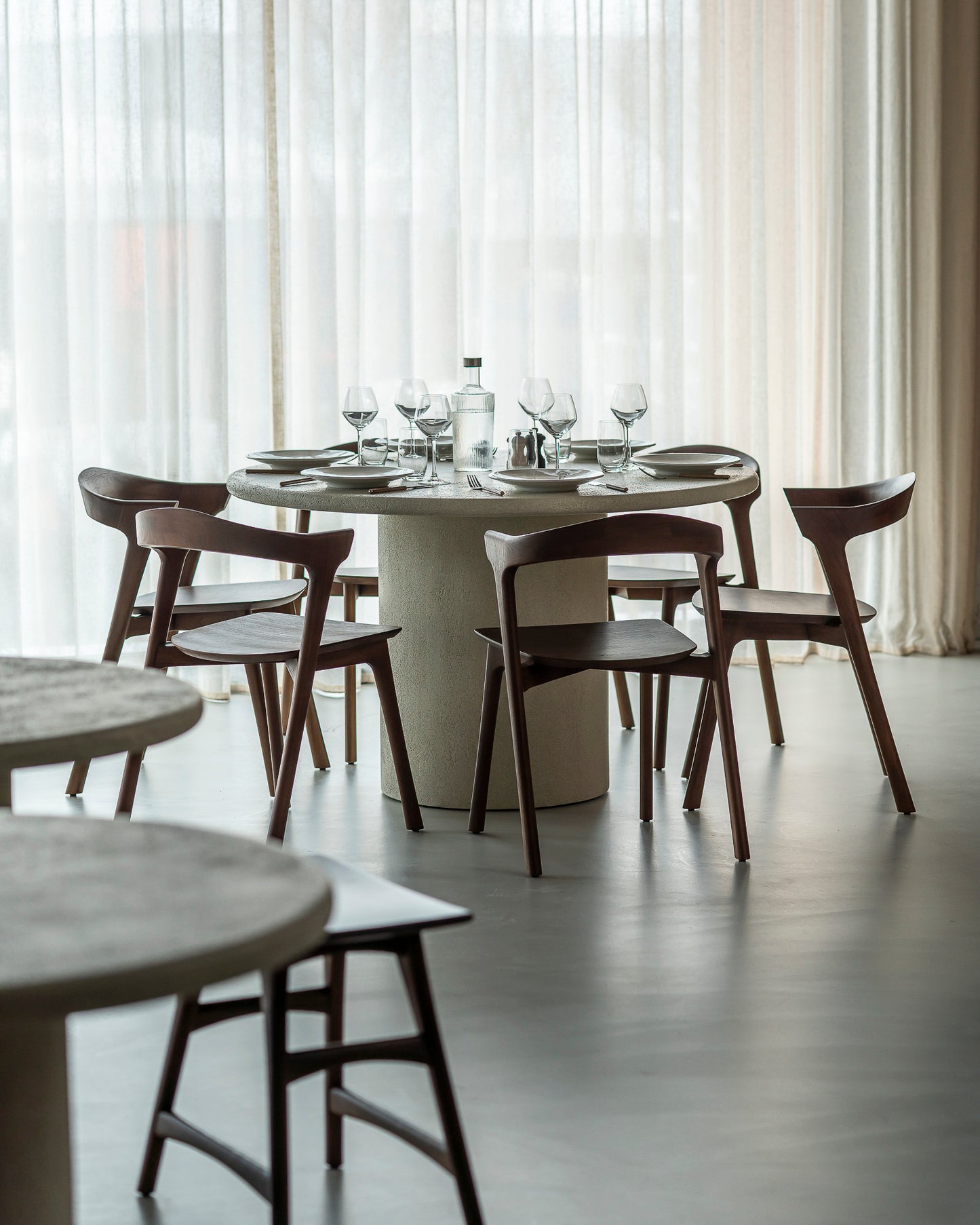 Round off white stone dining table modern minimalist dining room
