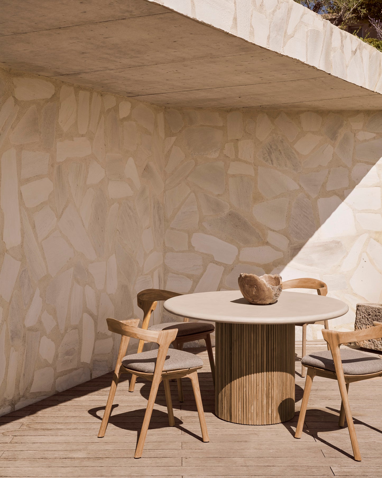 Roller-Max-dining-table-concrete-top-reclaimed-teak-base-Bok-outdoor-dining-chair-mocha-Goode-Studio