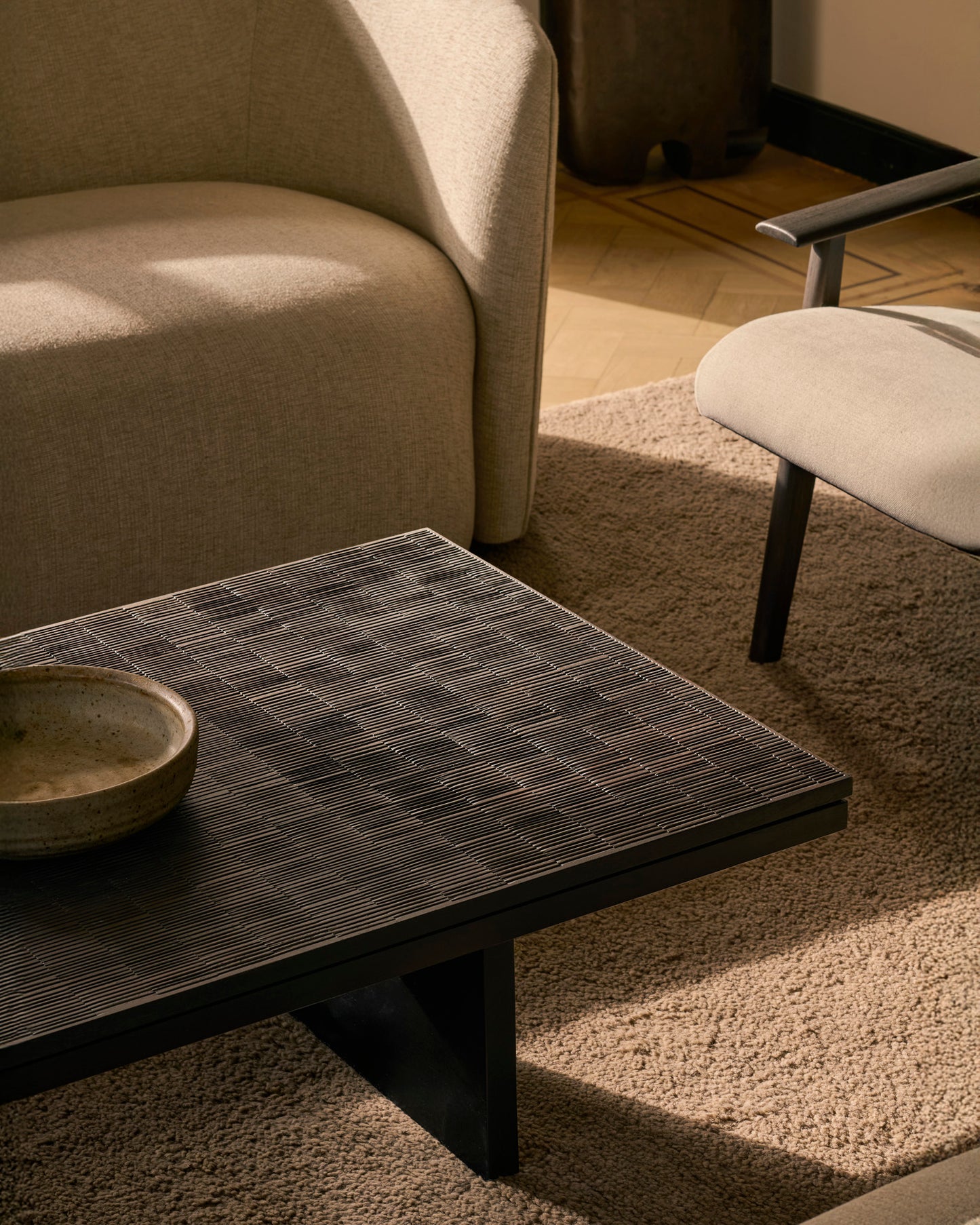 Grooves-coffee-table-varnished-teak-off-black-rectangular-Ellipse-sofa-Oatmeal-fabric-Aspekt-lounge-chair-varnished-teak-dark-brown-Warm-Ash
