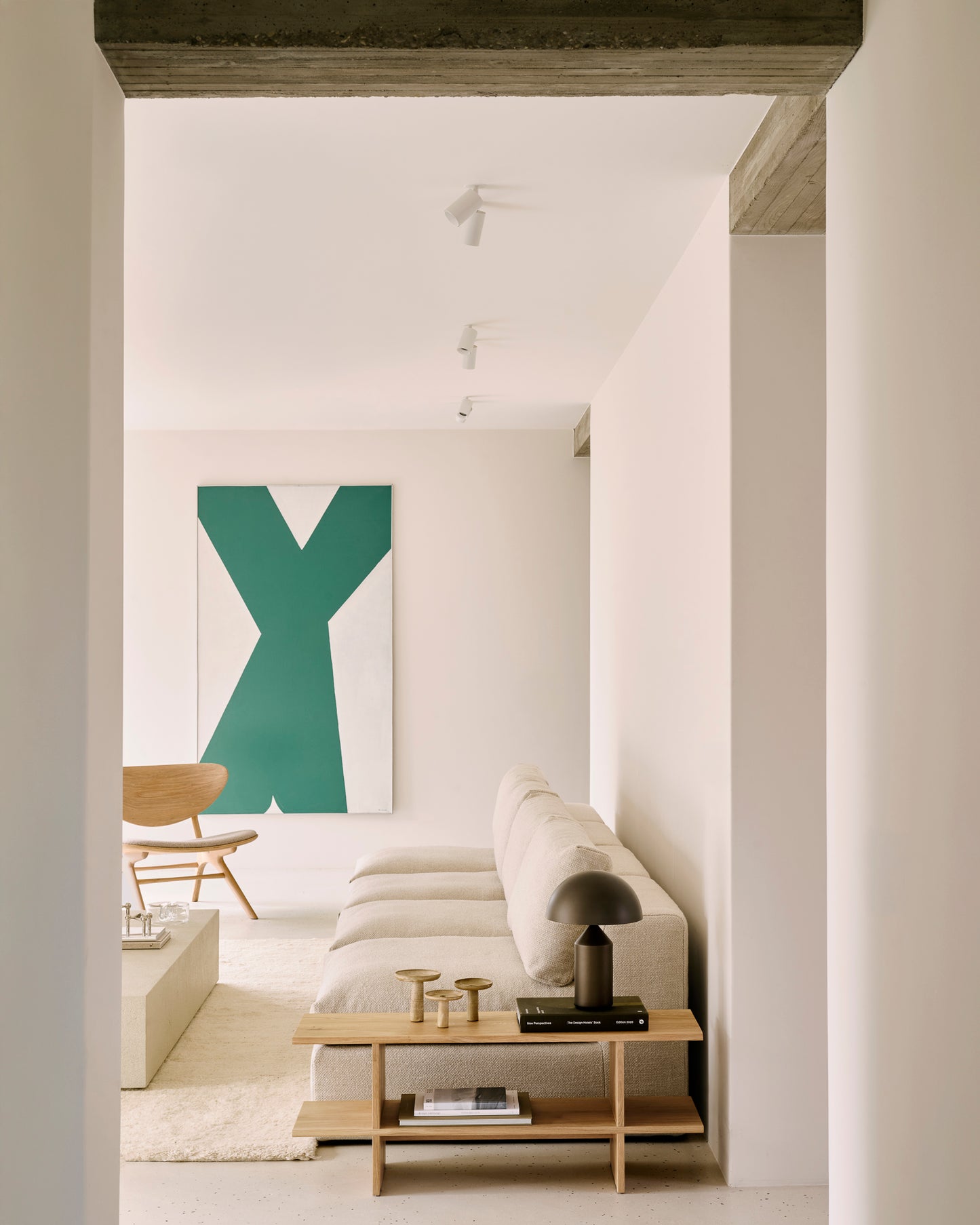 Mellow-modular-sofa-ivory-Kabuki-side-table-Eye-lounge-chair-off-white-Elements-floor-shelf-Dunes-rug-Sand-Goode-Studio