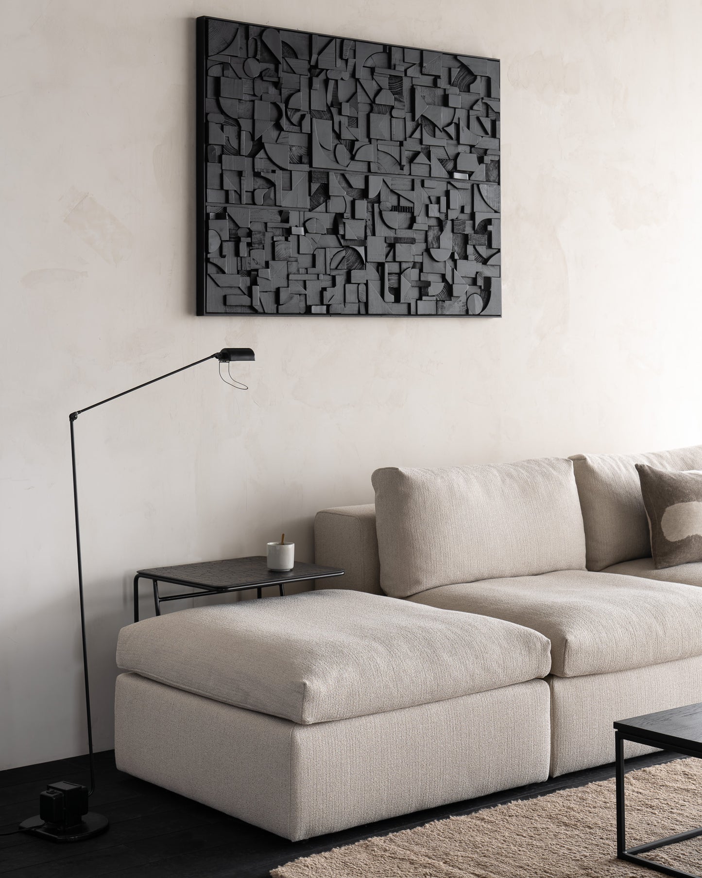 Mellow-sofa-Ellipse-side-table-Thin-coffee-table-Bricks-wall-art-Dunes-rug-Goode-Studio