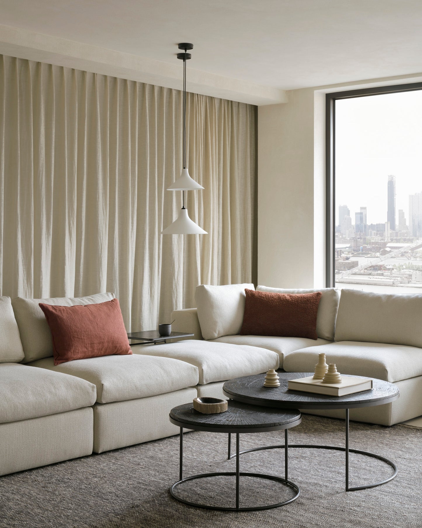 Mellow-modular-sofa-Ellipse-side-table-Nesting-coffee-table-slice-umber-triptic-side-table-Goode-Studio
