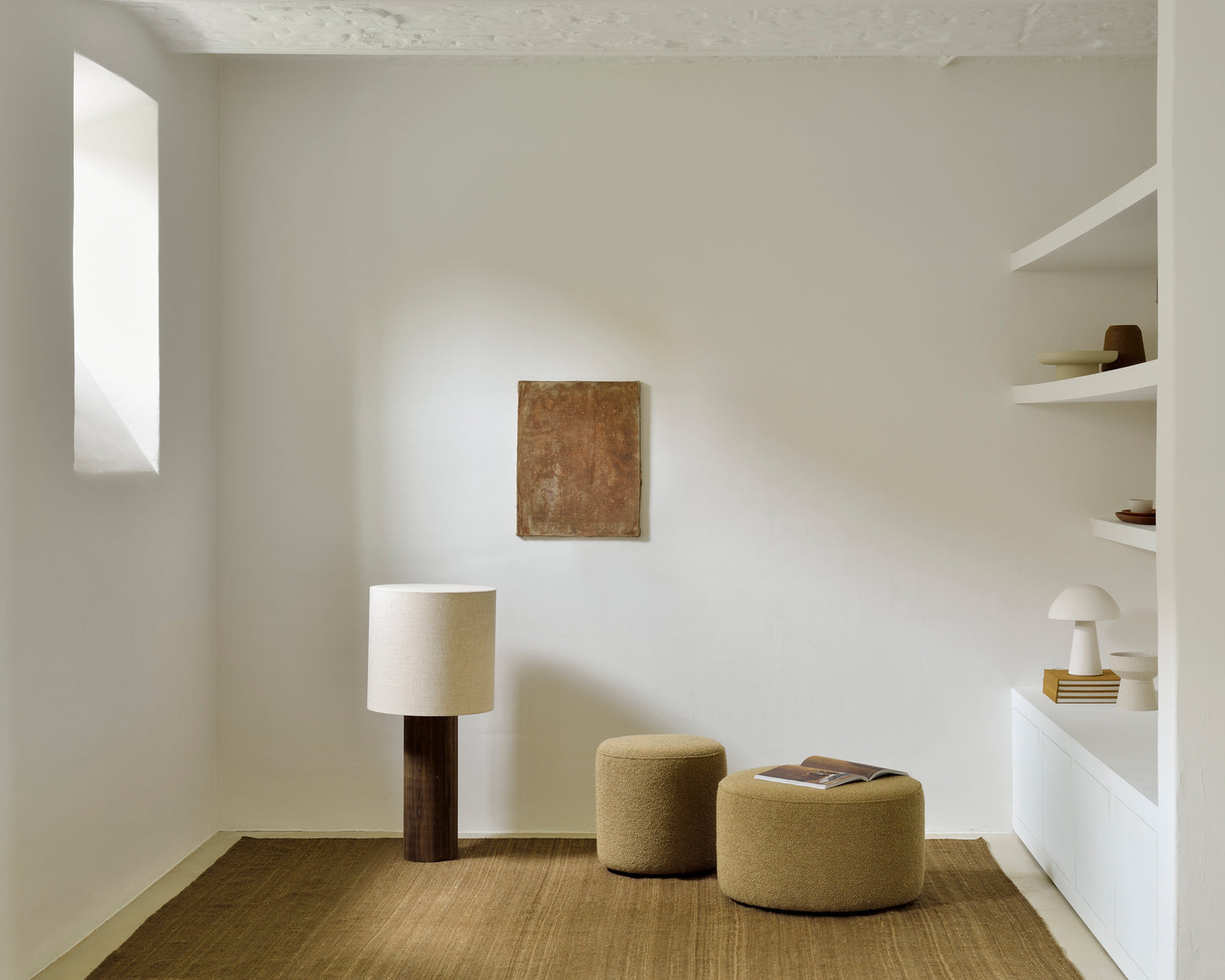 Barrow pouf in ginger styled with Nomad Kilim rug in cumin by Goode Studio