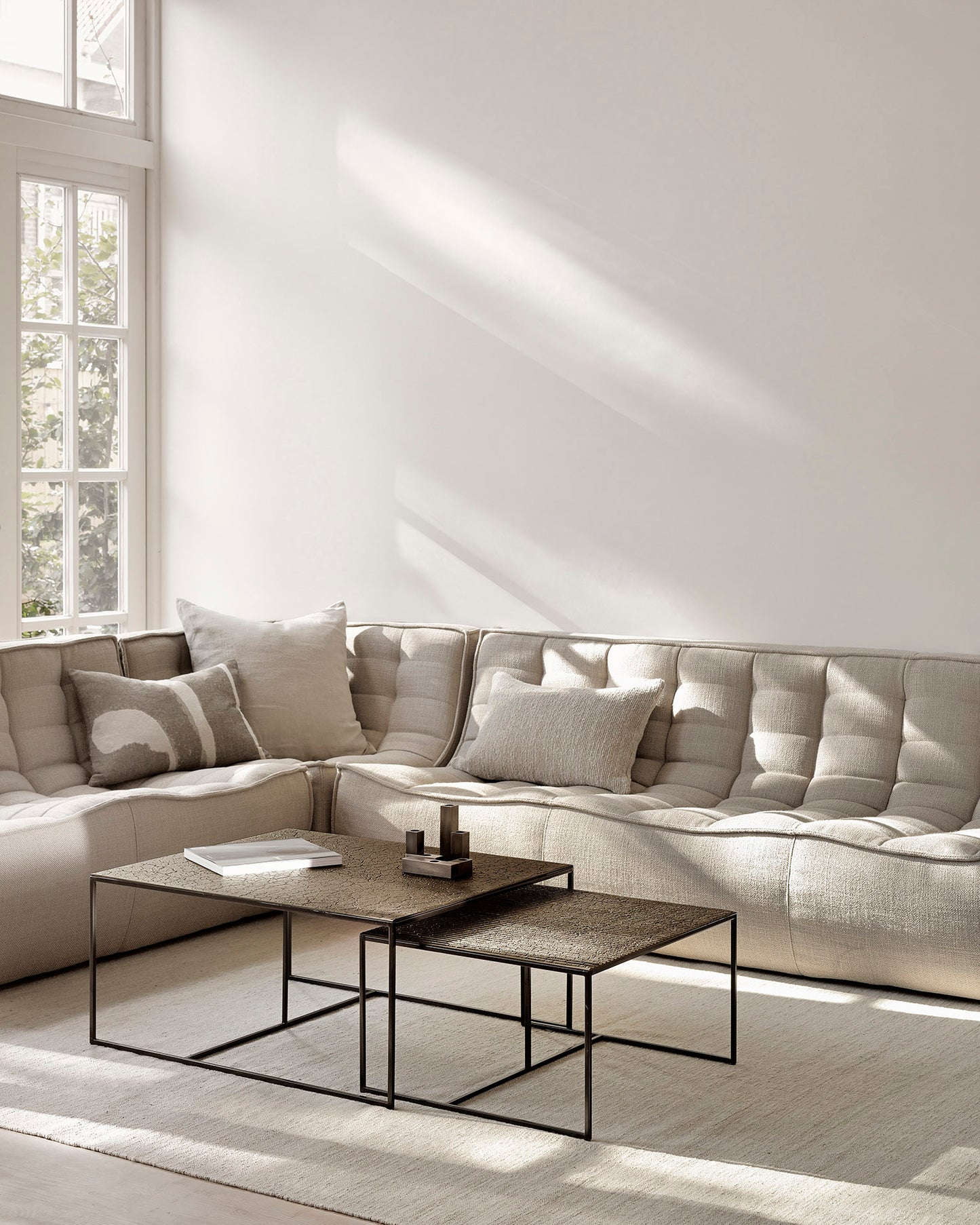N701-sofa-beige-Oat-Lin-Sauvage-cushions-Oat-Nomad-cushion-Sand-Nomad-kilim-rug-Pentagon-nesting-coffee-table-whisky-Abstract-Goode-Studio
