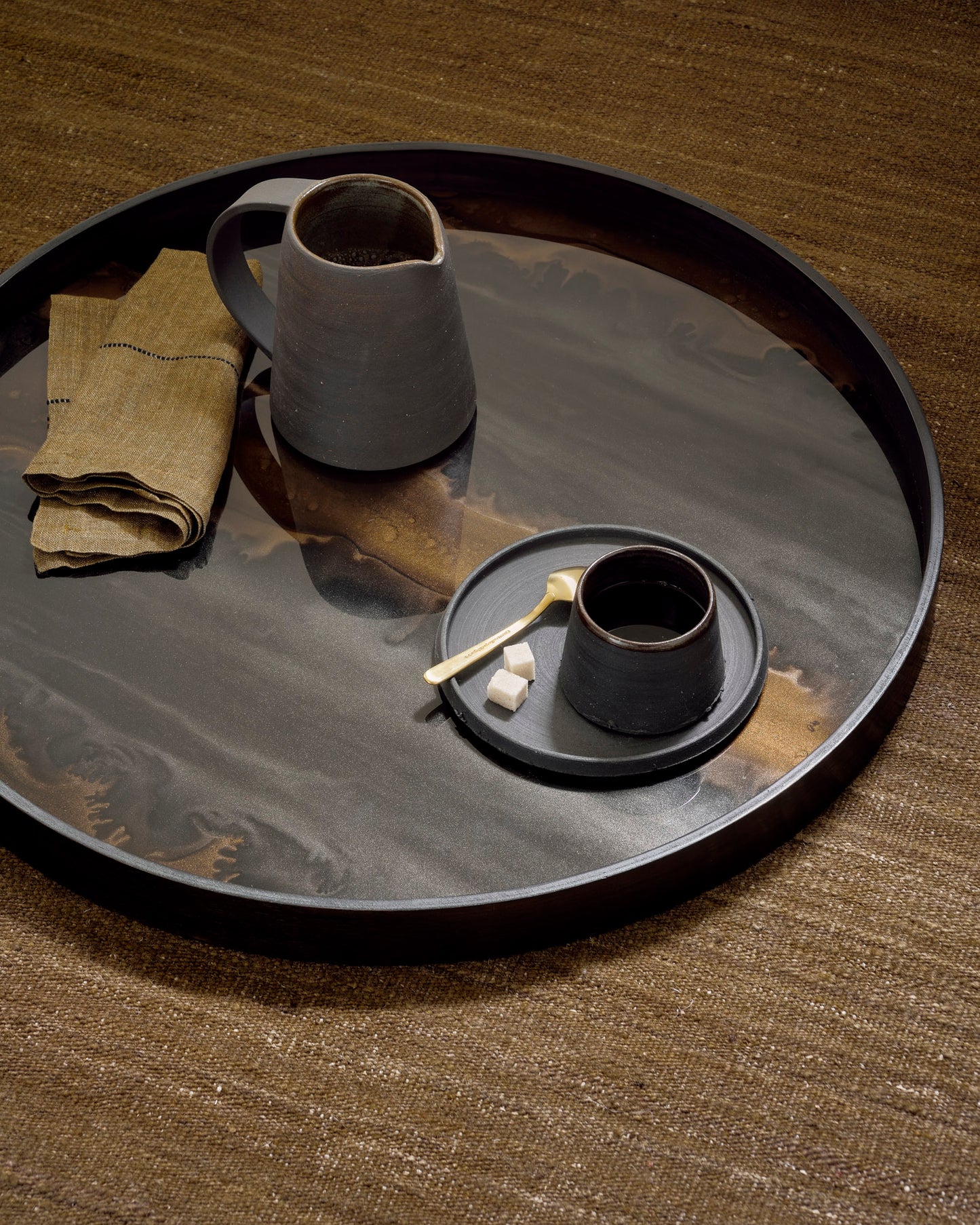 Bronze-organic-tray-glass-61cm-Cumin-nomad-kilim-rug-Goode-Studio