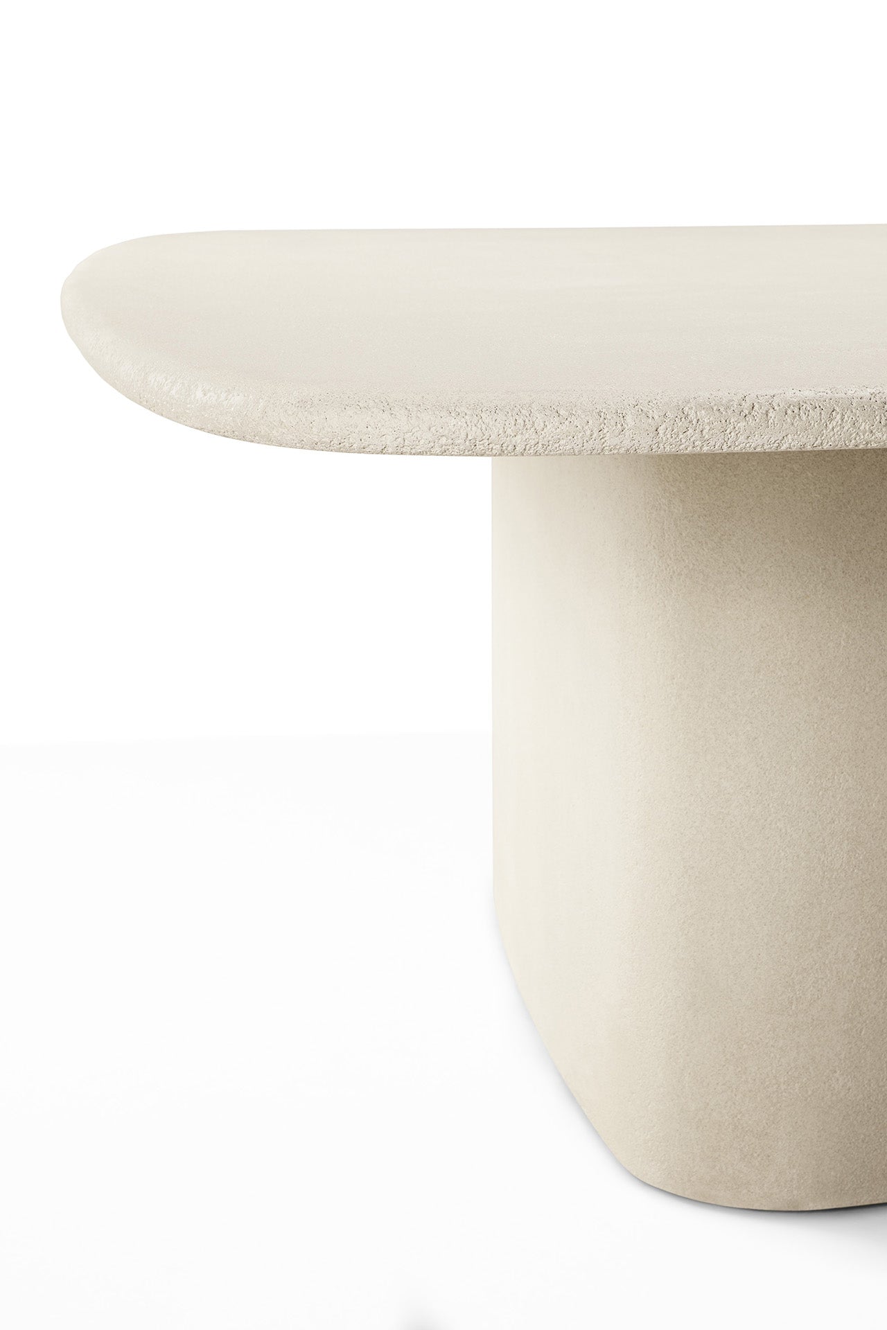 Contemporary organic microcement dining table with sculptural design