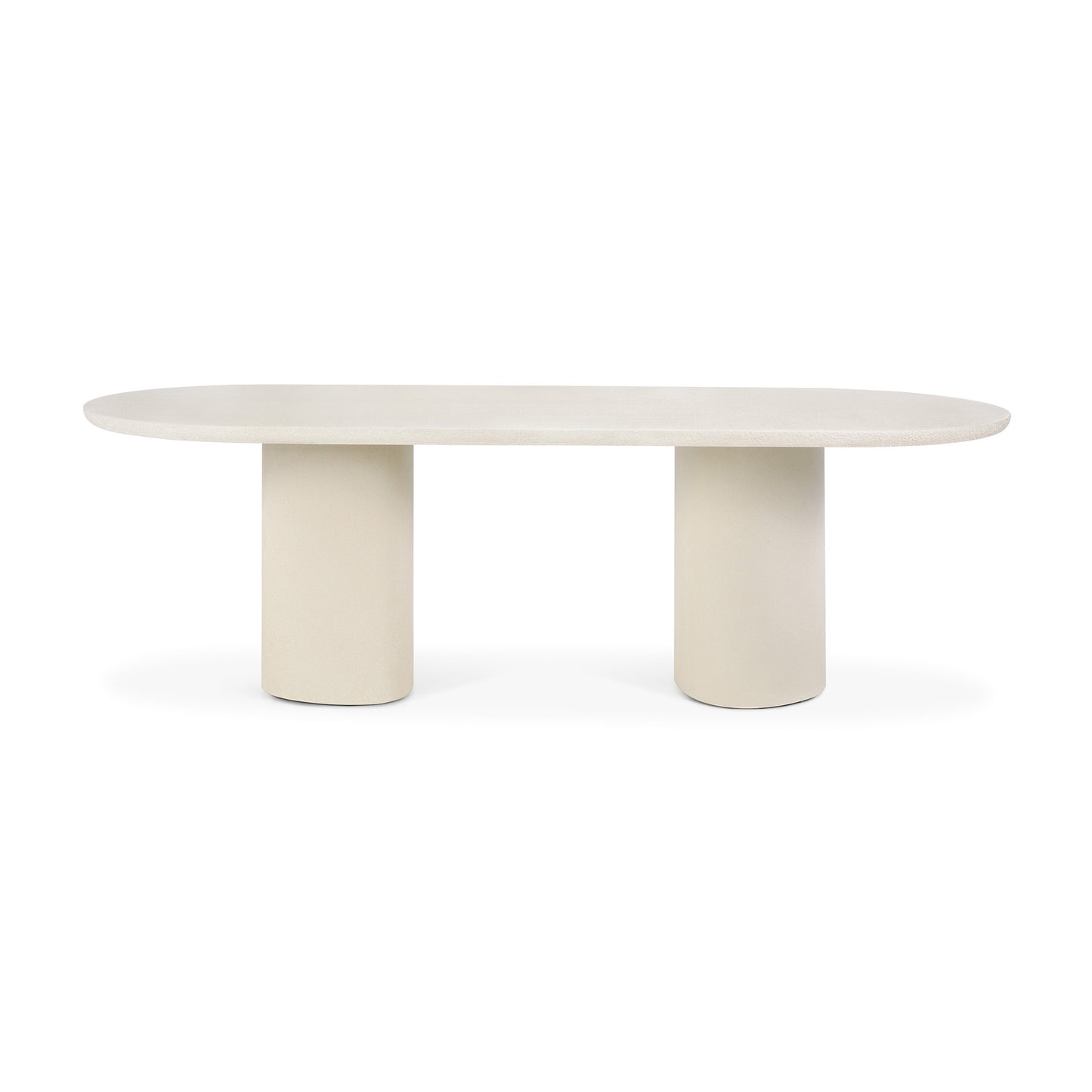 Elements oblong dining table with microcement stone finish
