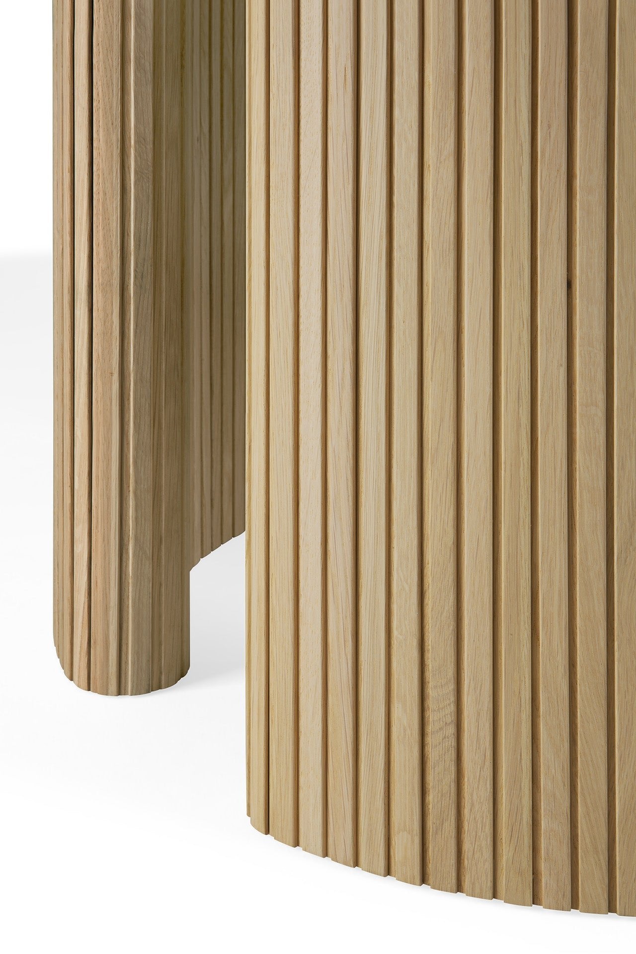 Roller Max dining table stacked wood base architectural design
