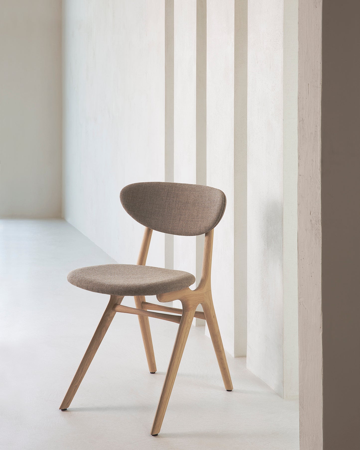 Eye-dining-chair-varnished-oak-warm-grey-fabric-upholstered-Goode-Studio