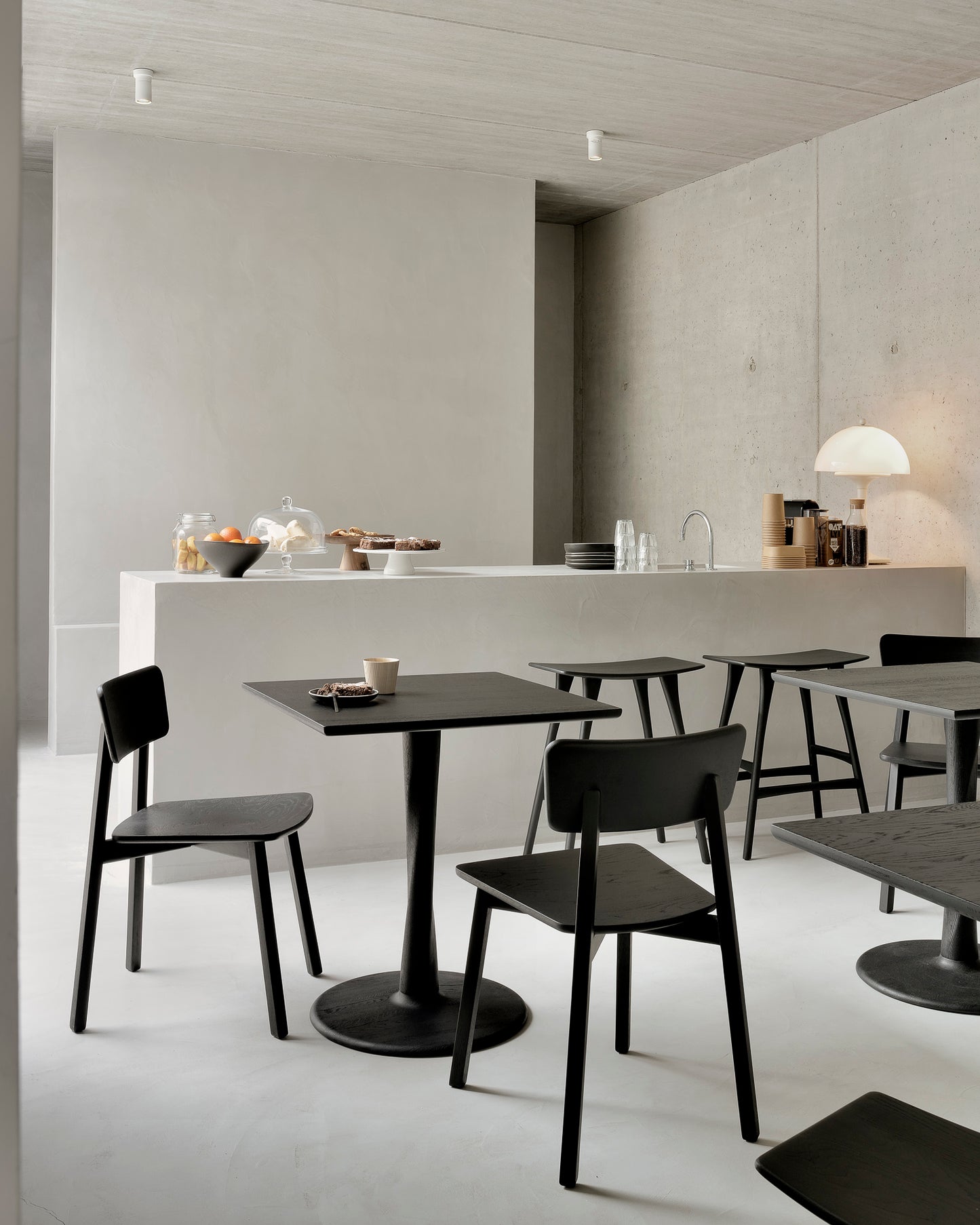 Oak-Casale-black-dining-chair-Oak-Torsion-square-black-dining-table-Oak-Osso-black-bar-stool-1-Goode-Studio
