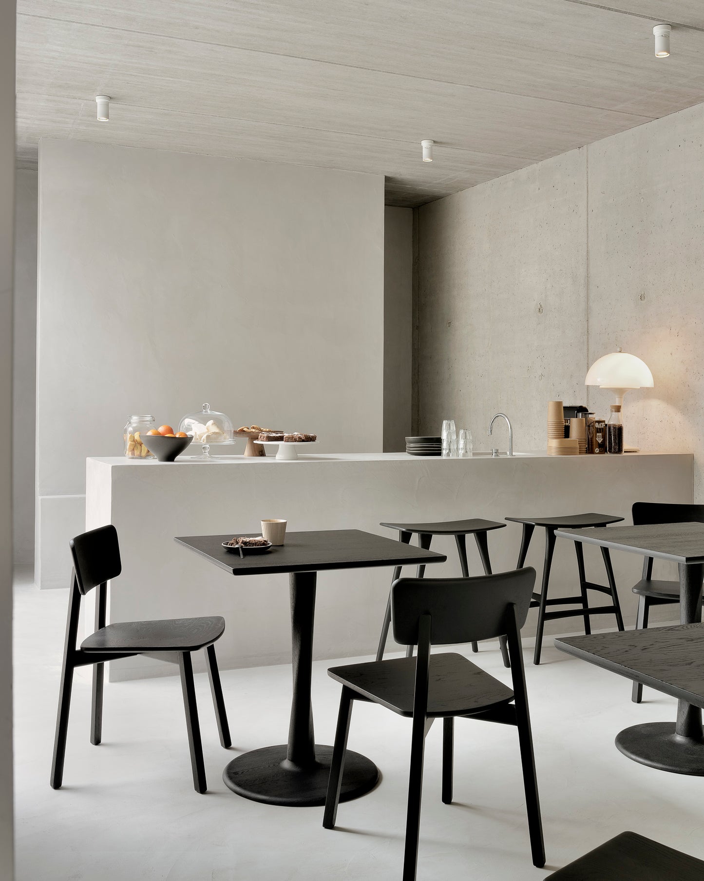 Oak-Casale-black-dining-chair-Oak-Torsion-square-black-dining-table-Oak-Osso-black-bar-stool-2-Goode-Studio