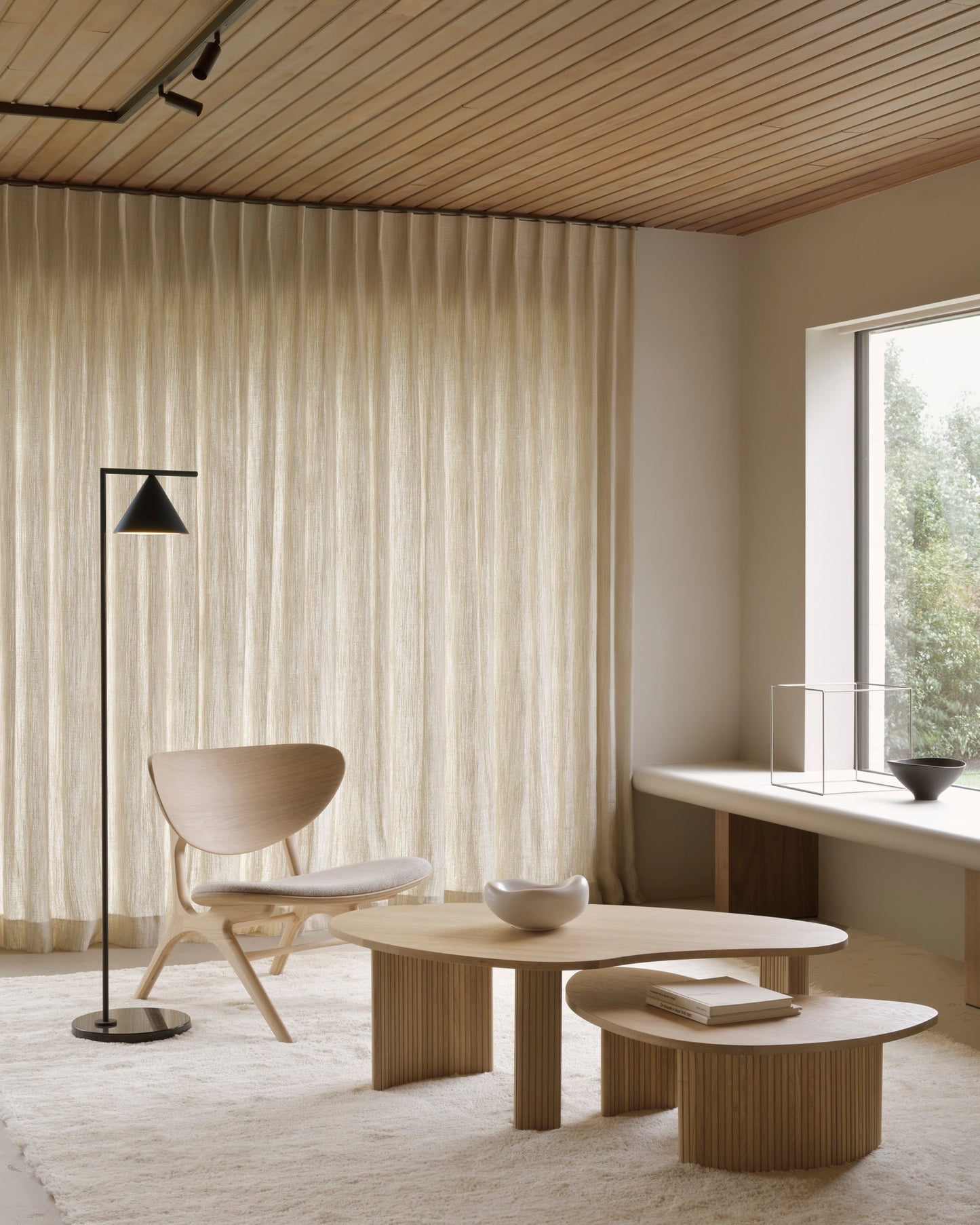 Eye-lounge-chair-oak-off-white-Boomerang-coffee-table-pebble-Goode-Studio