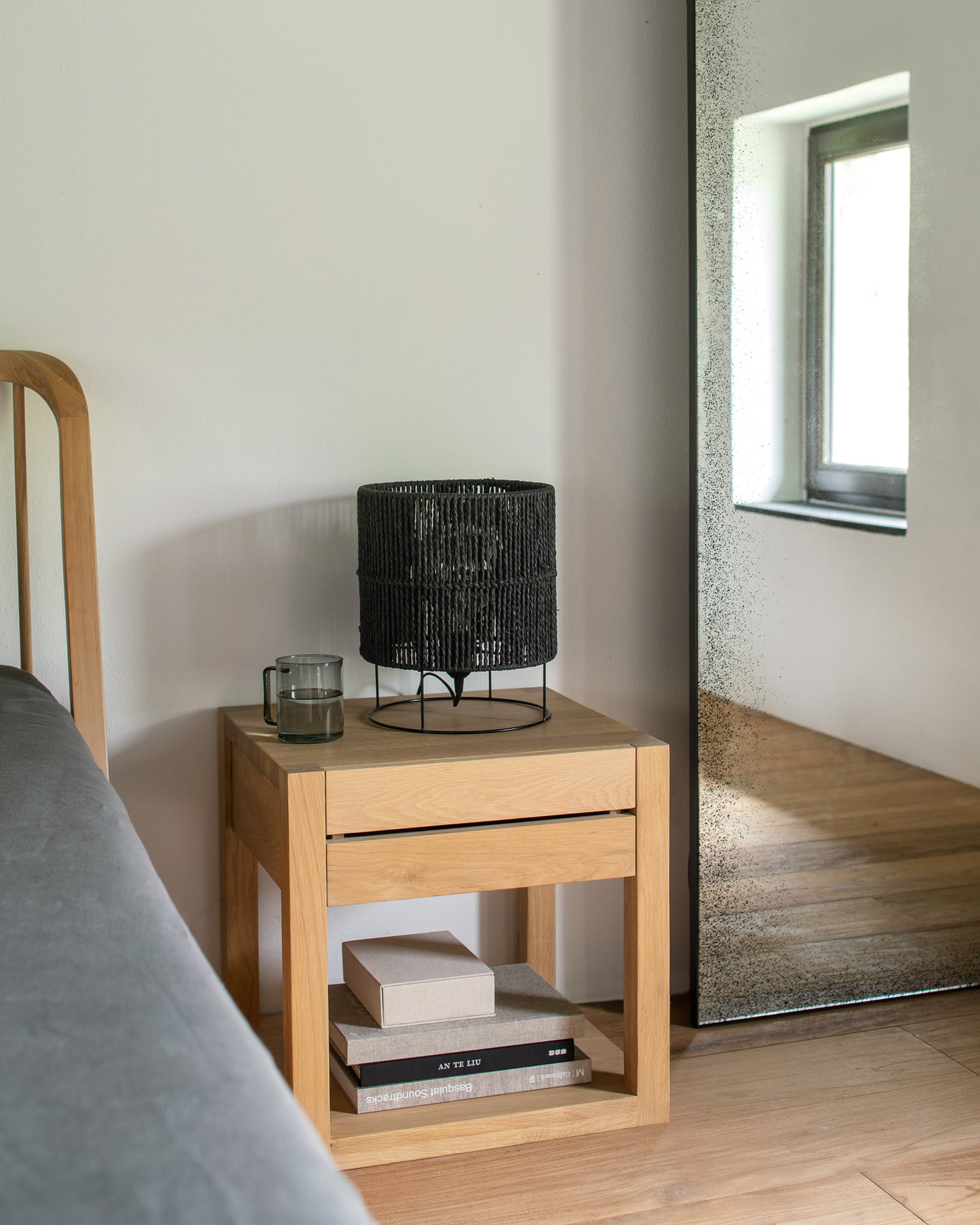 Compact solid oak bedside table for residential bedroom
