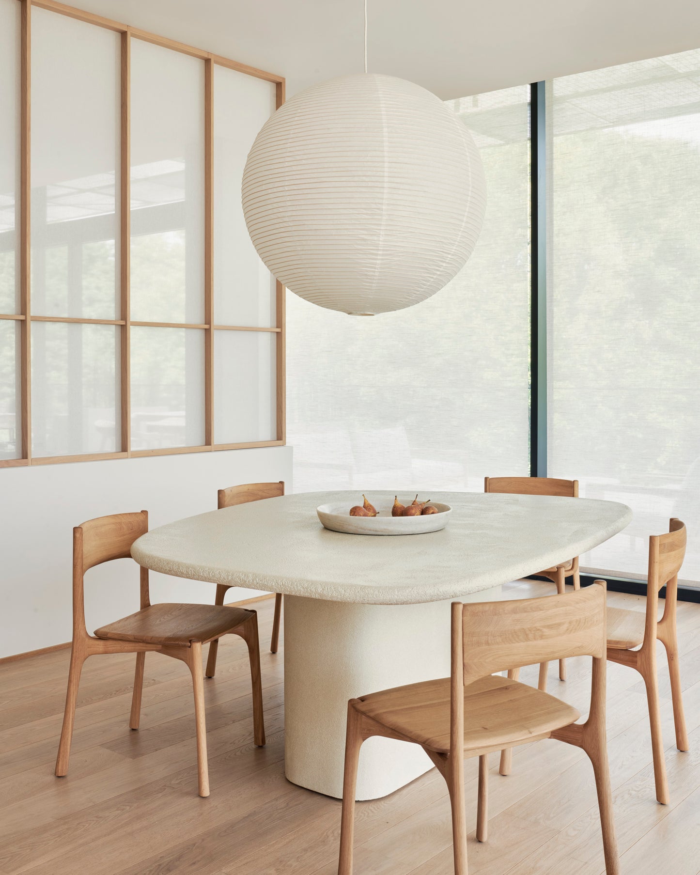 Elements collection pebble dining table with artisan textured surface
