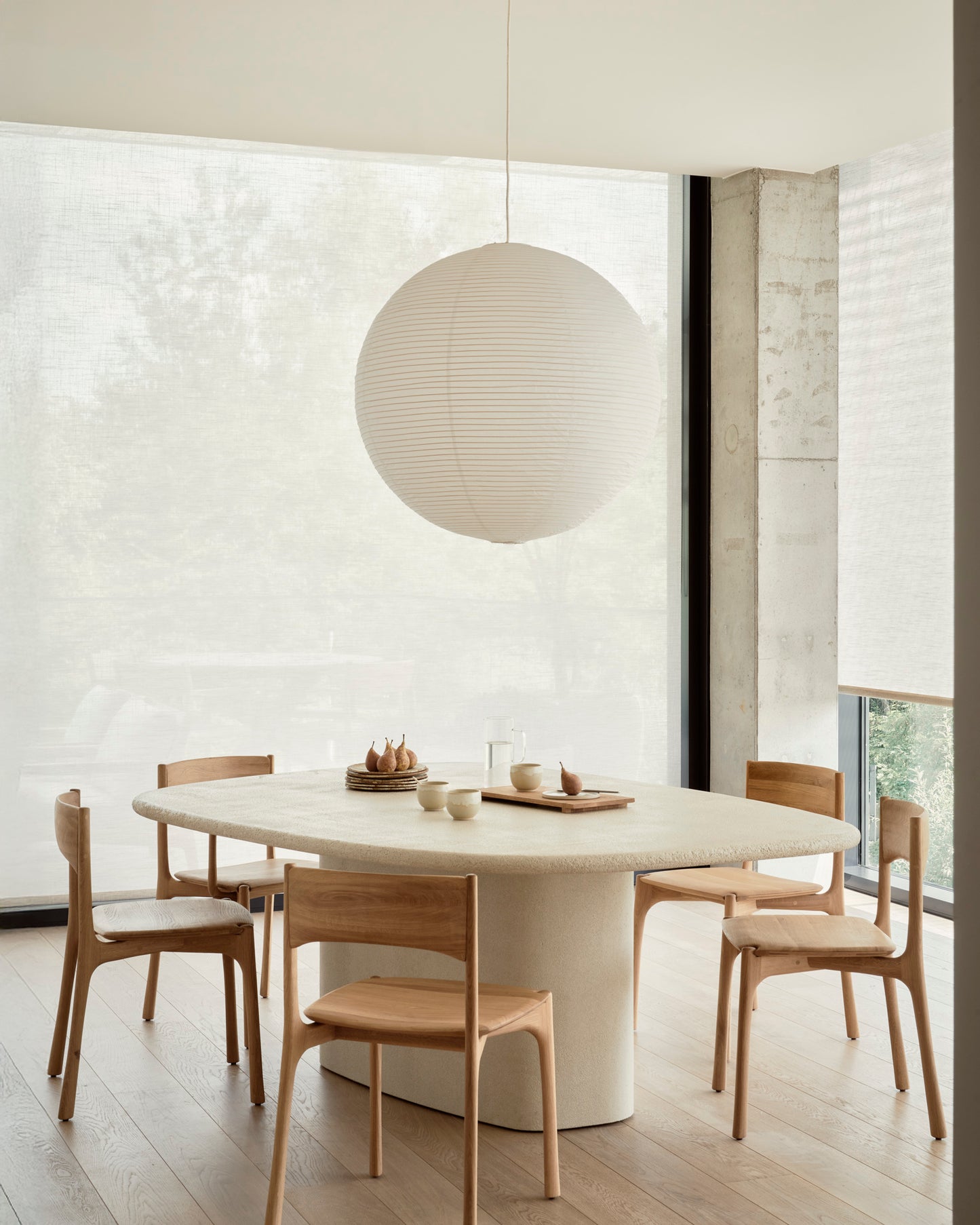 Off white sculptural pebble dining table for modern dining room
