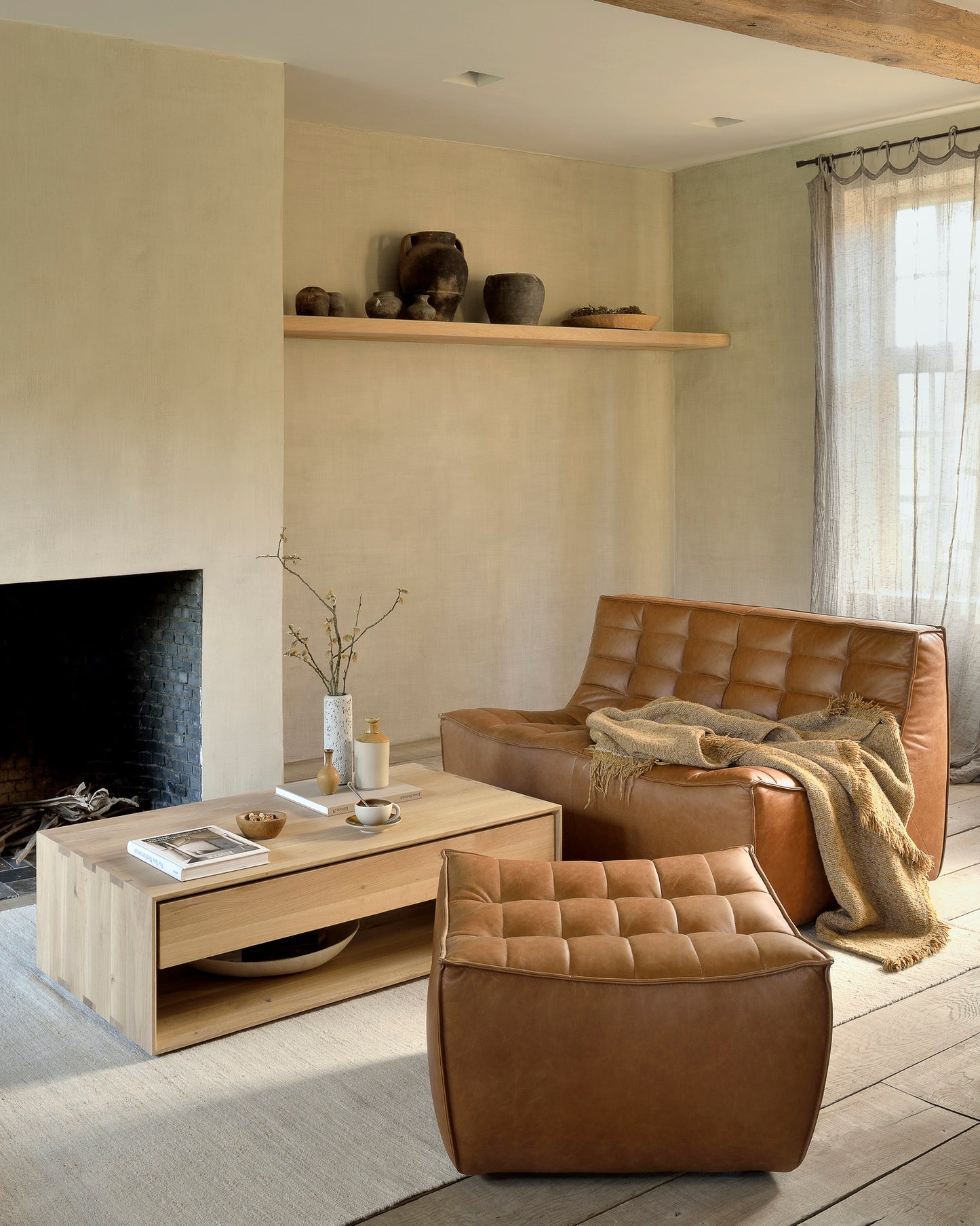 Oak-Nordic-coffee-table-Camel-Nomad-cushion-N701-sofa-2-seater-old-saddle-1-seater-old-saddle-N701-sofa-footstool-old-saddle-Sand-Nomad-kilim-rug-Goode-Studio