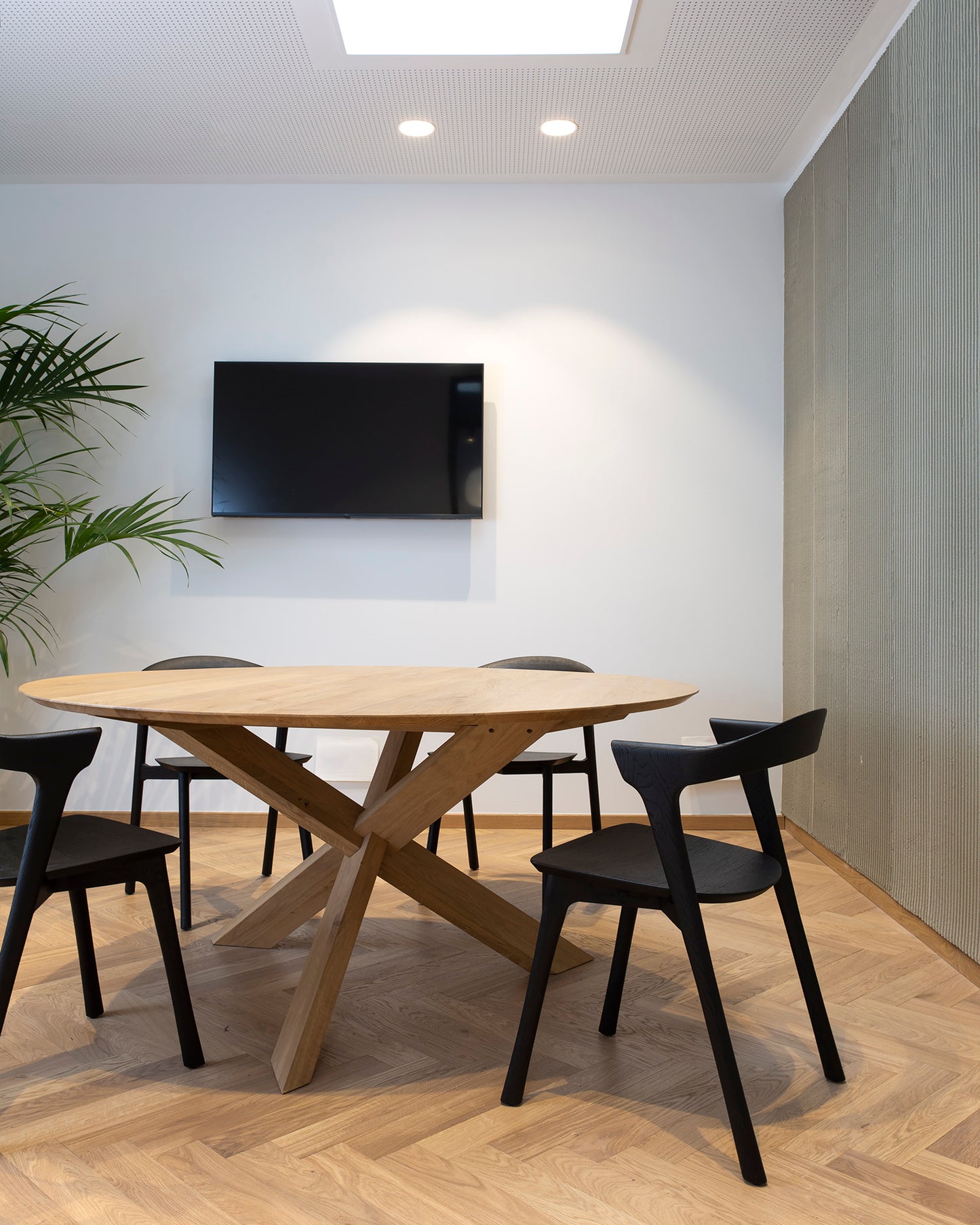 Bok-dining-chair-black-Oak-Circle-dining-table-Goode-Studio