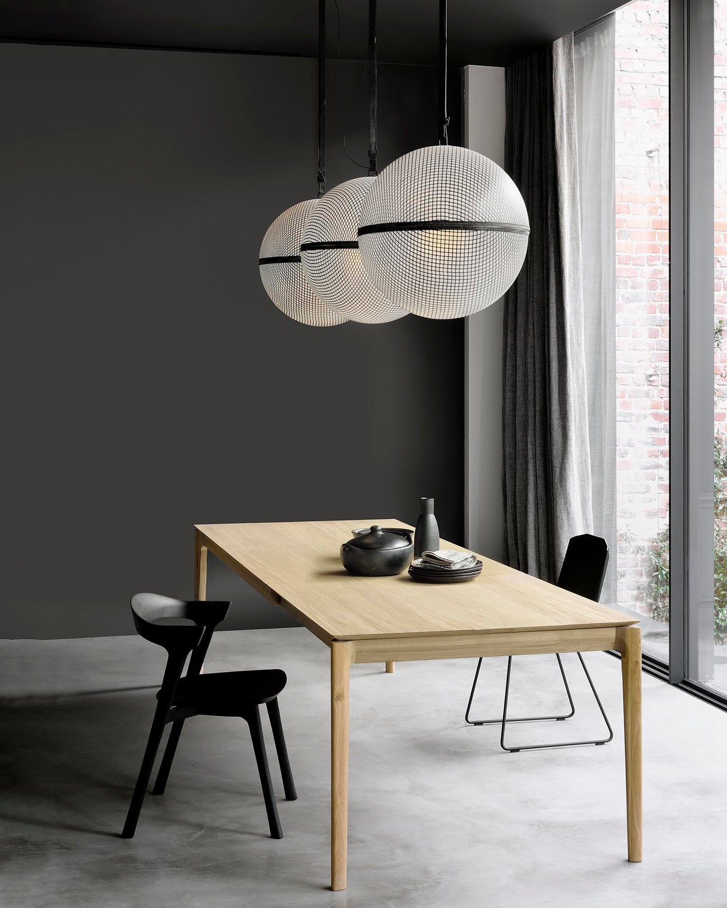 Modern extendable oak dining table for residential and commercial spaces